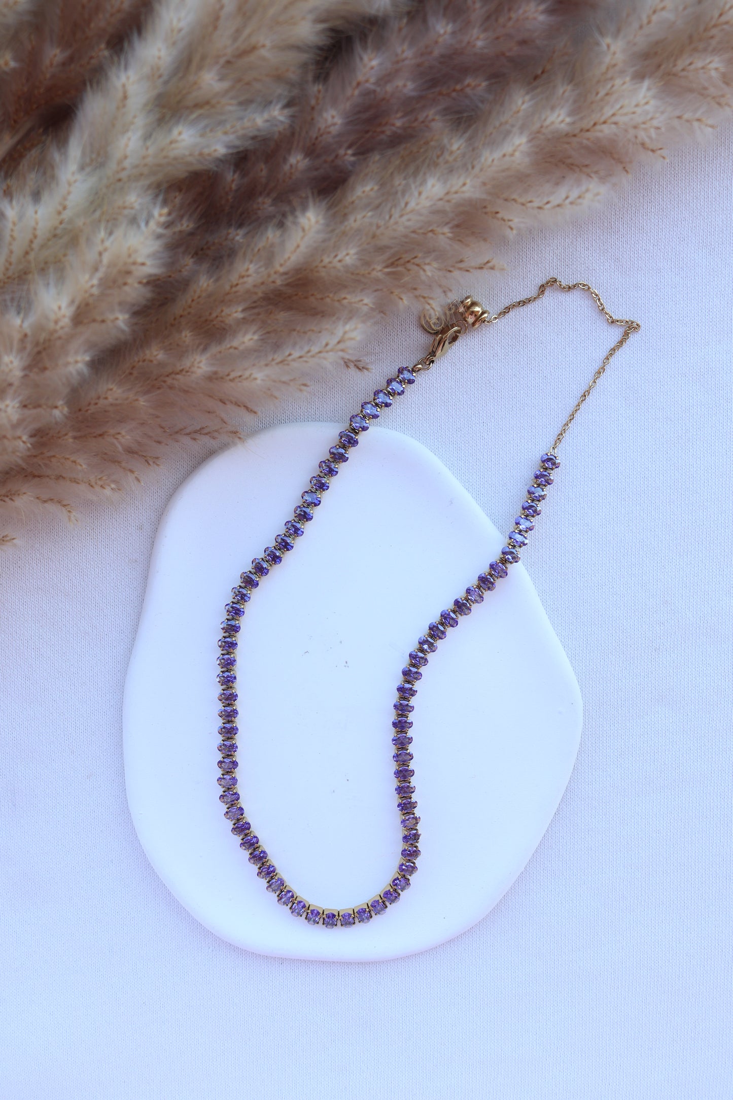 Colar de Aço Dourado Inspiração Swarovski com Zircônias Roxas