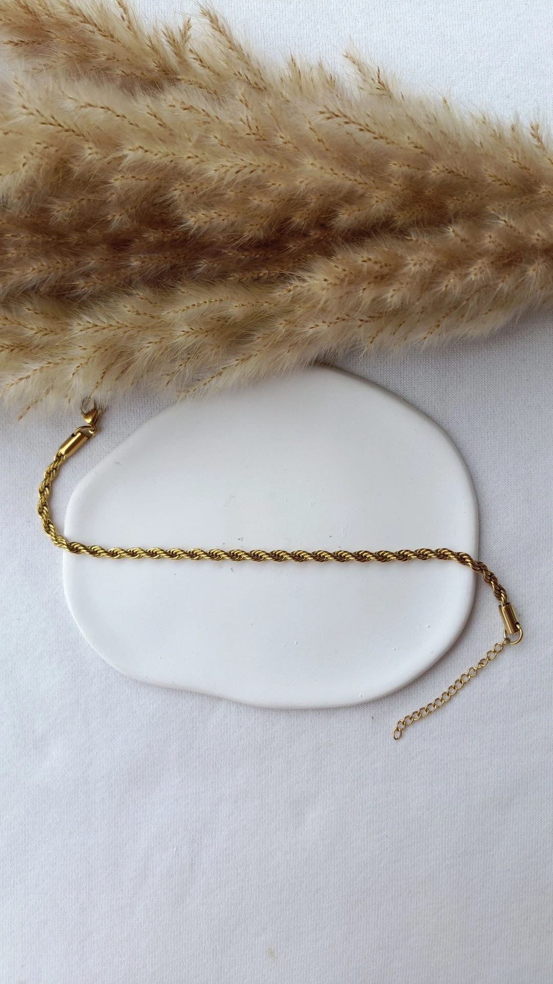 Pulseira de Aço Dourado de Pé Entrelaçada
