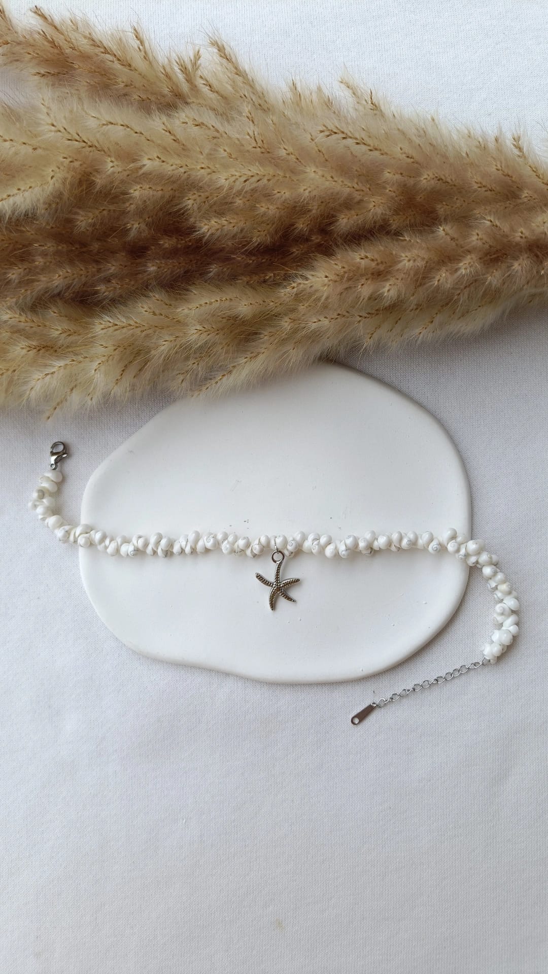 Pulseira de Aço Prateado com Pendente de Estrela