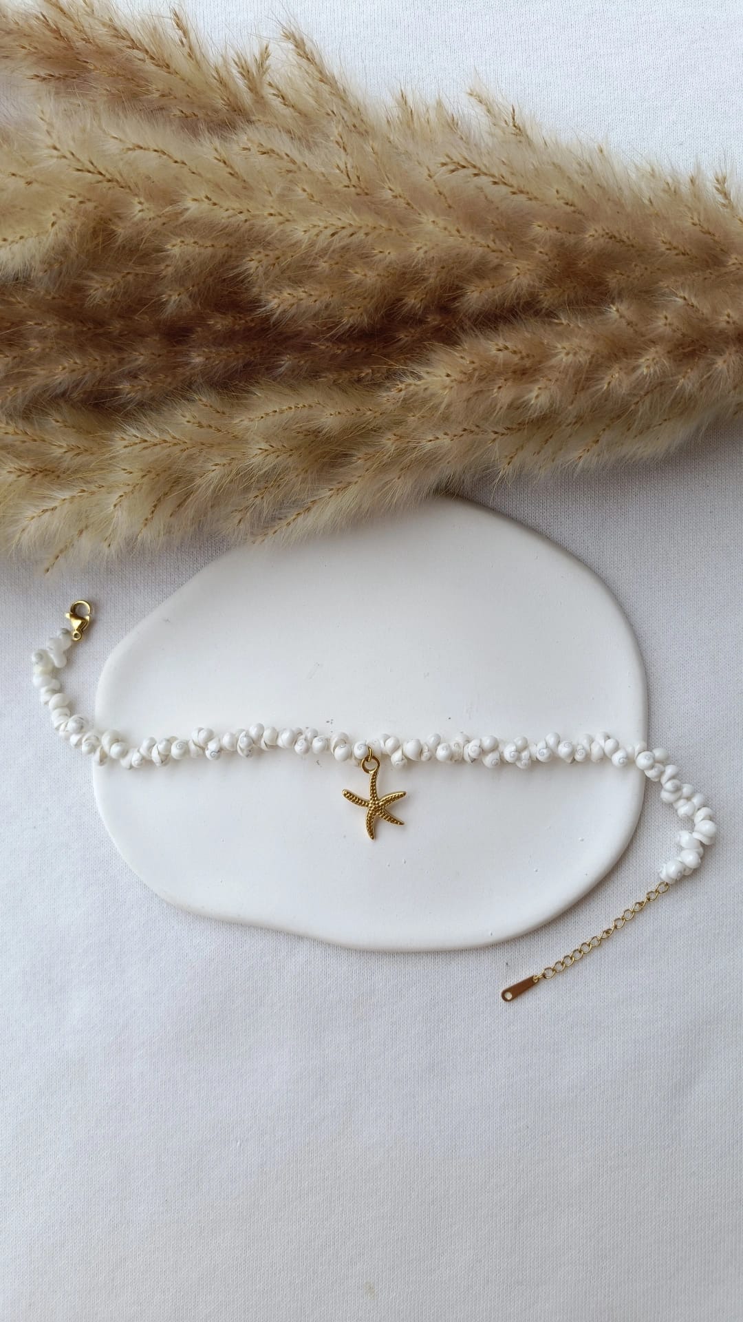 Pulseira de Aço Dourado com Pendente de Estrela