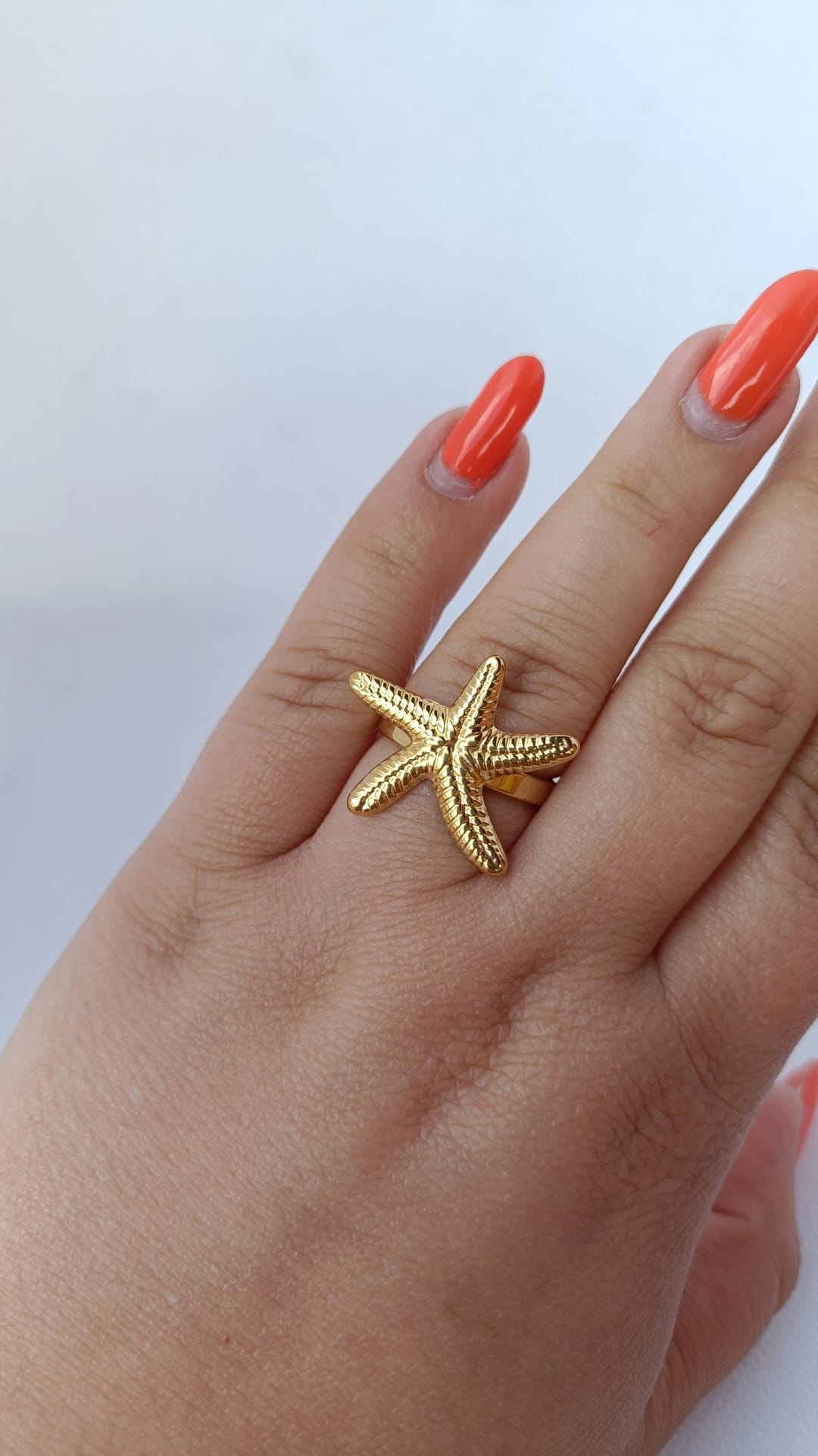 Anel de Aço Dourado de Estrela do Mar