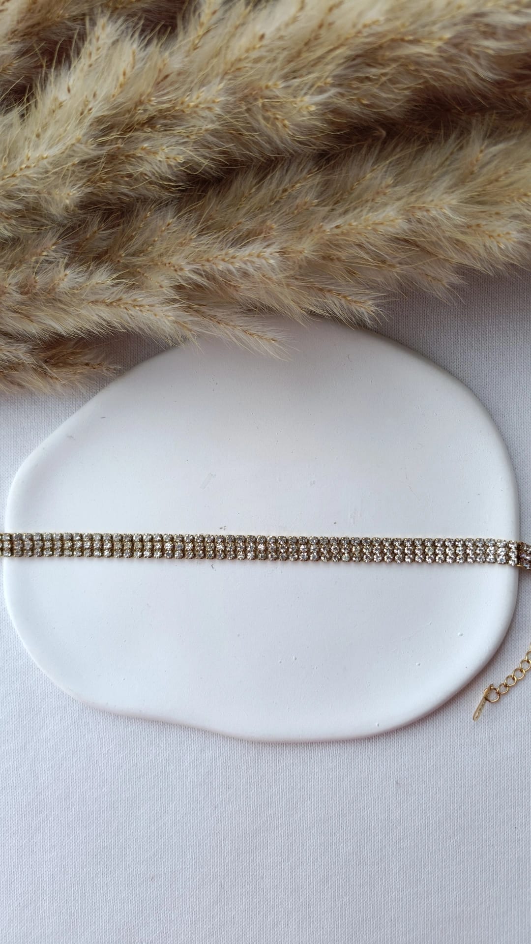 Pulseira de Aço Dourado Tripla com Brilhantes
