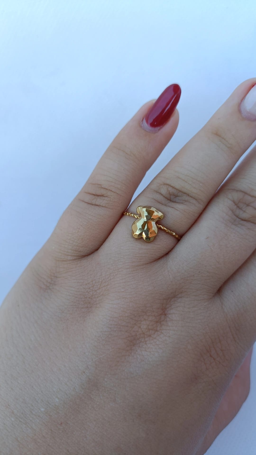 Anel de Aço Dourado de Urso