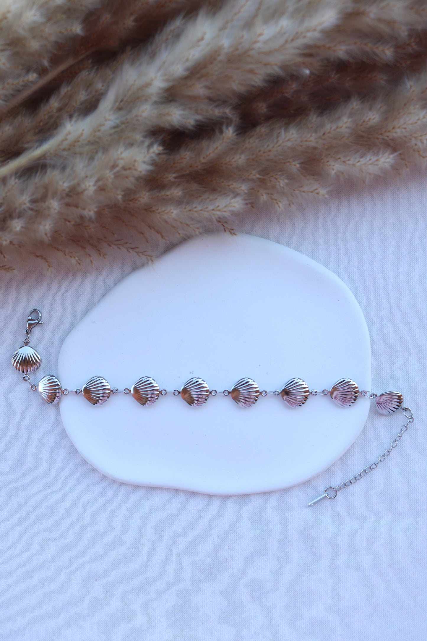 Pulseira de Aço Prateado de Pé de Conchas