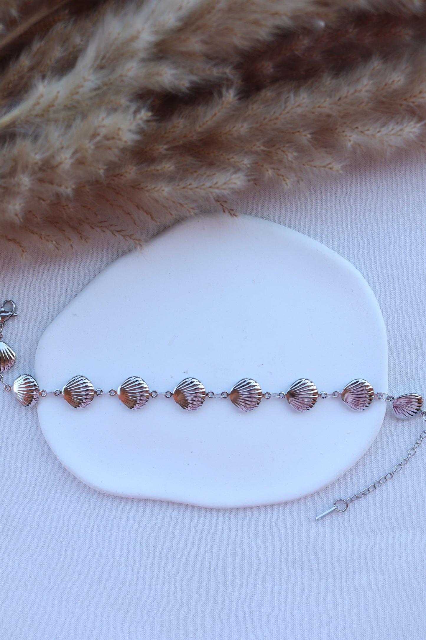 Pulseira de Aço Prateado de Pé de Conchas