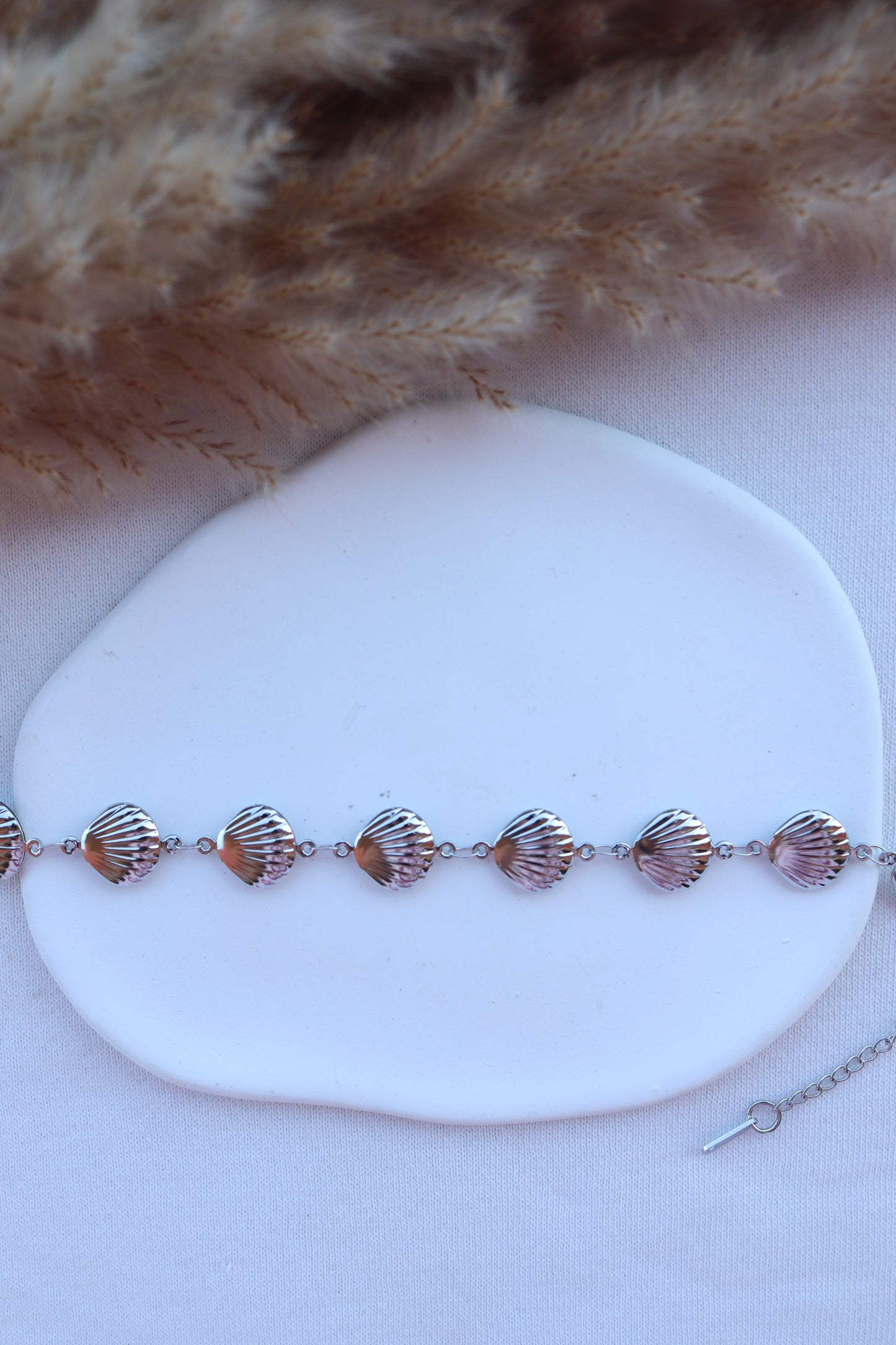 Pulseira de Aço Prateado de Pé de Conchas