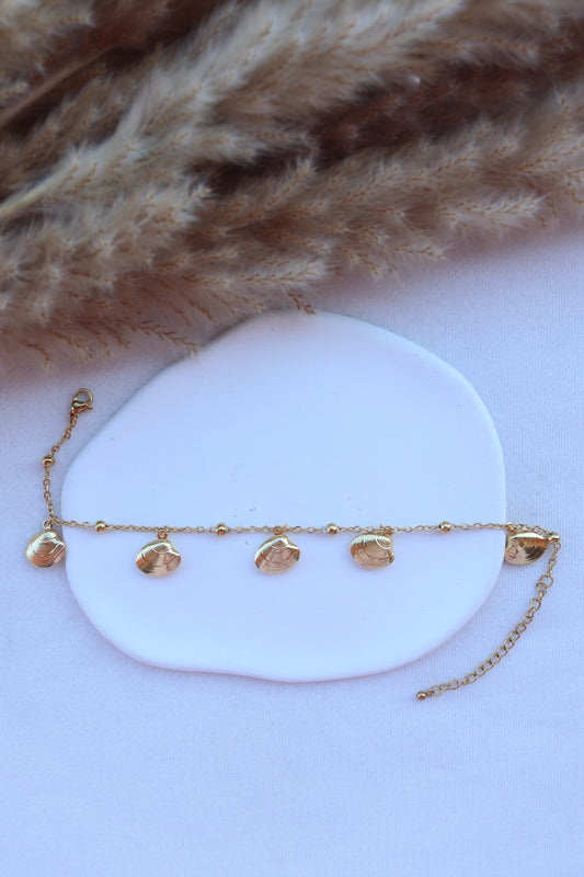 Pulseira de Aço Dourado de Pé com Bolinhas + Conchas