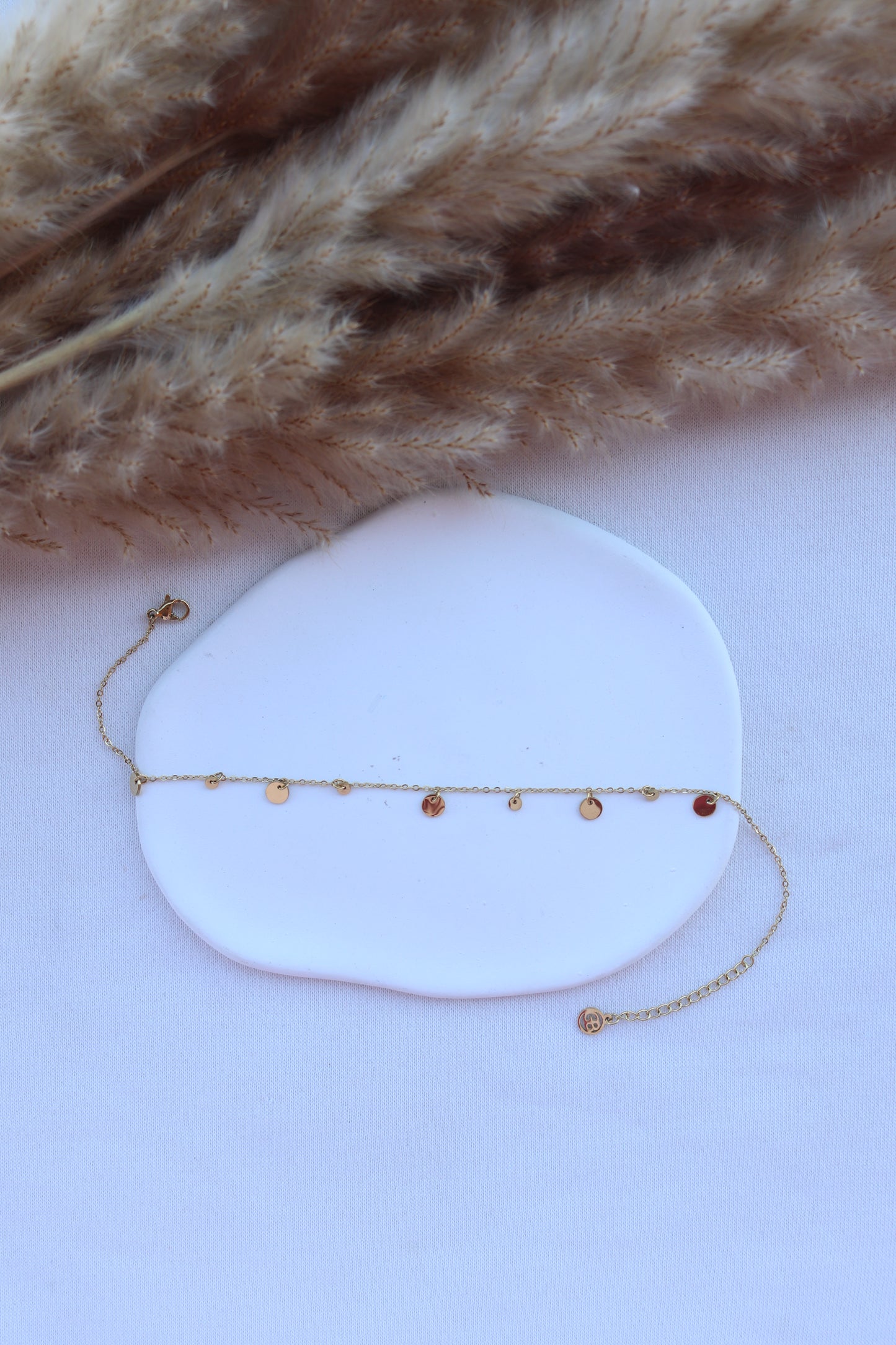 Pulseira de Aço Dourado de Pé com Bolinhas