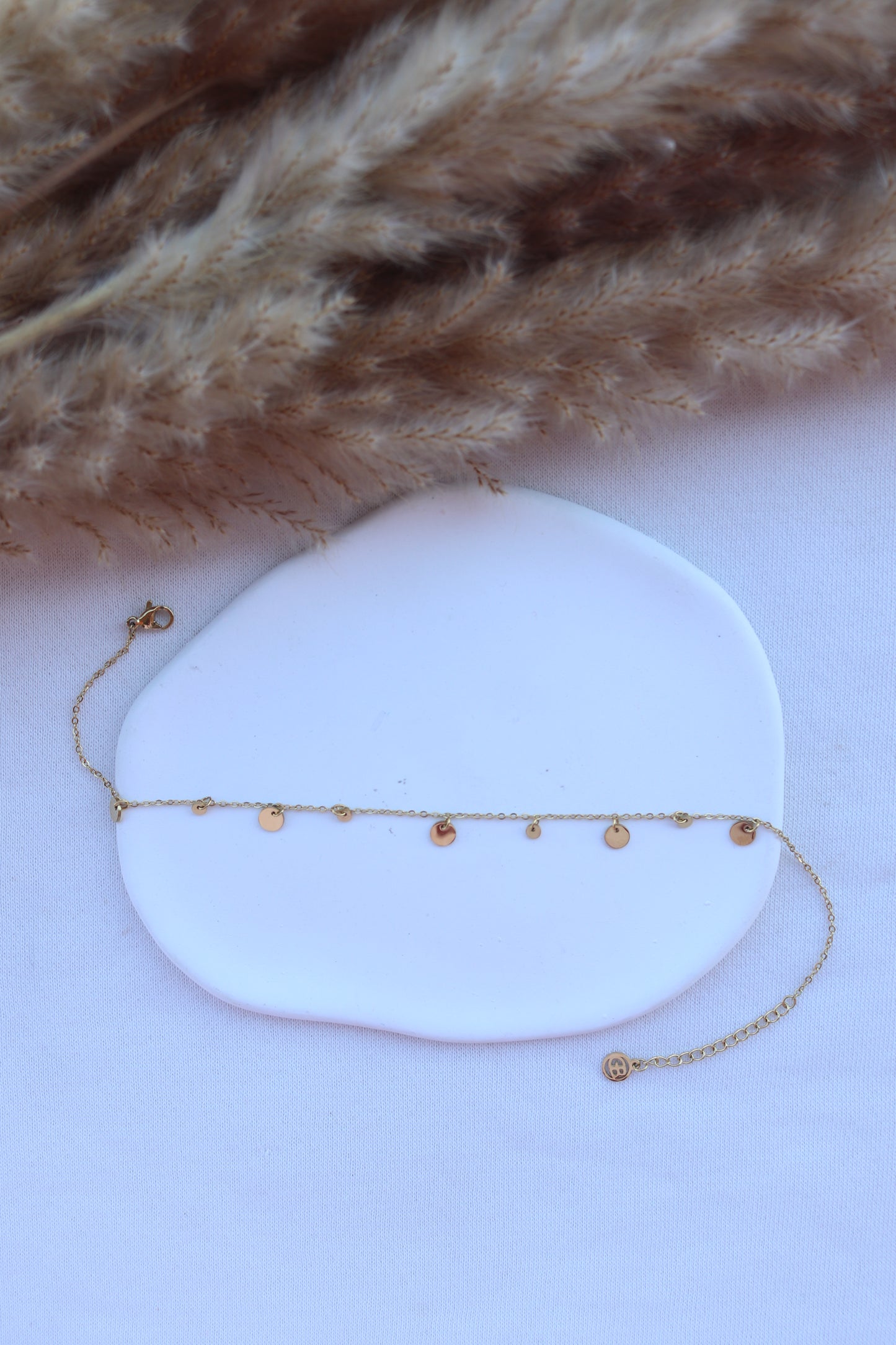 Pulseira de Aço Dourado de Pé com Bolinhas