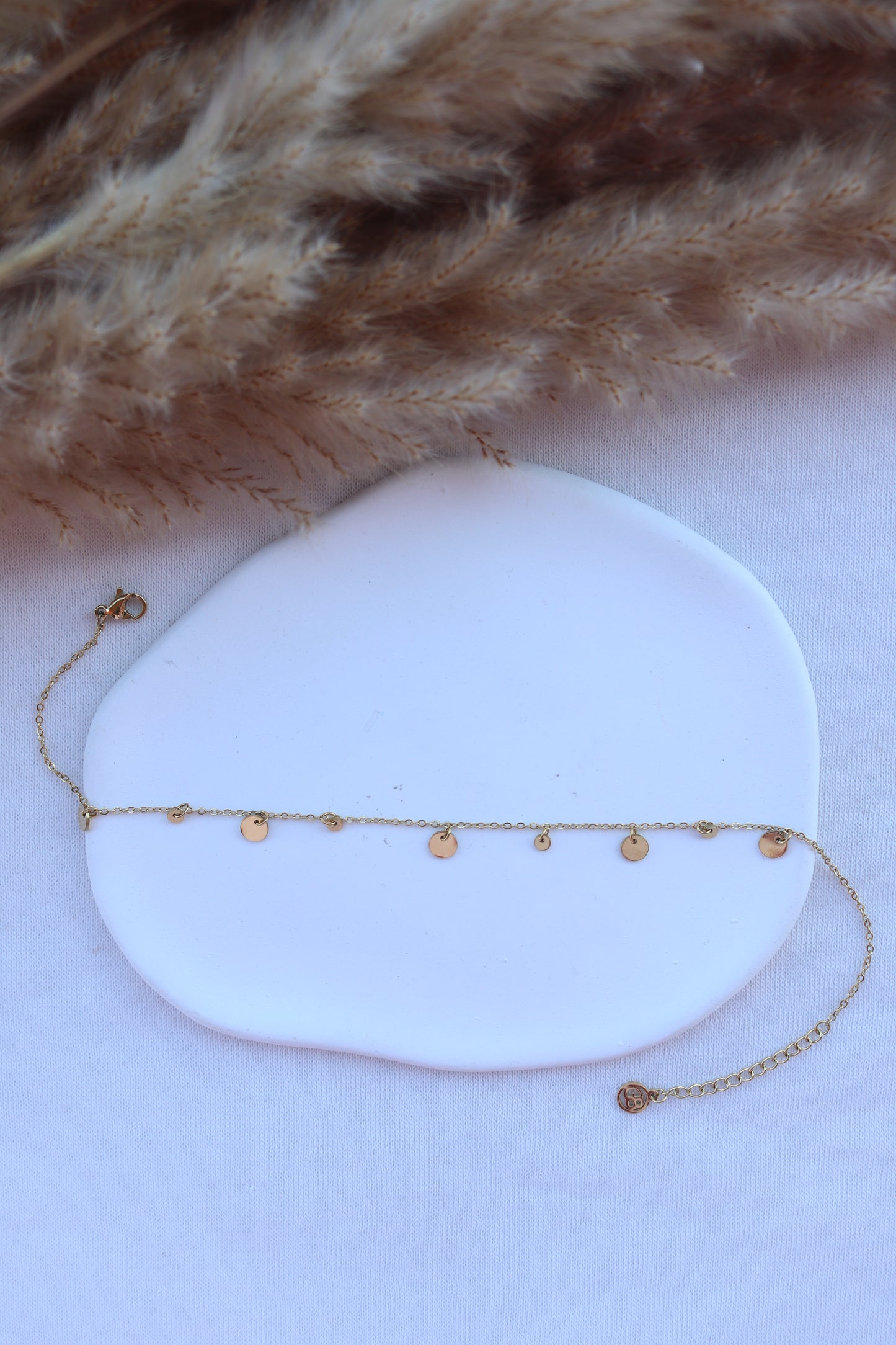 Pulseira de Aço Dourado de Pé com Bolinhas