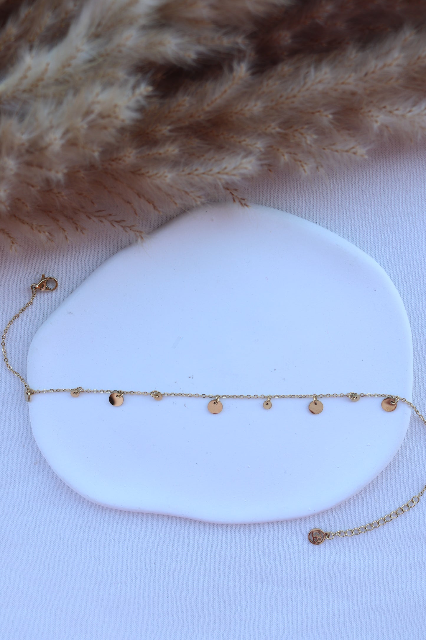 Pulseira de Aço Dourado de Pé com Bolinhas