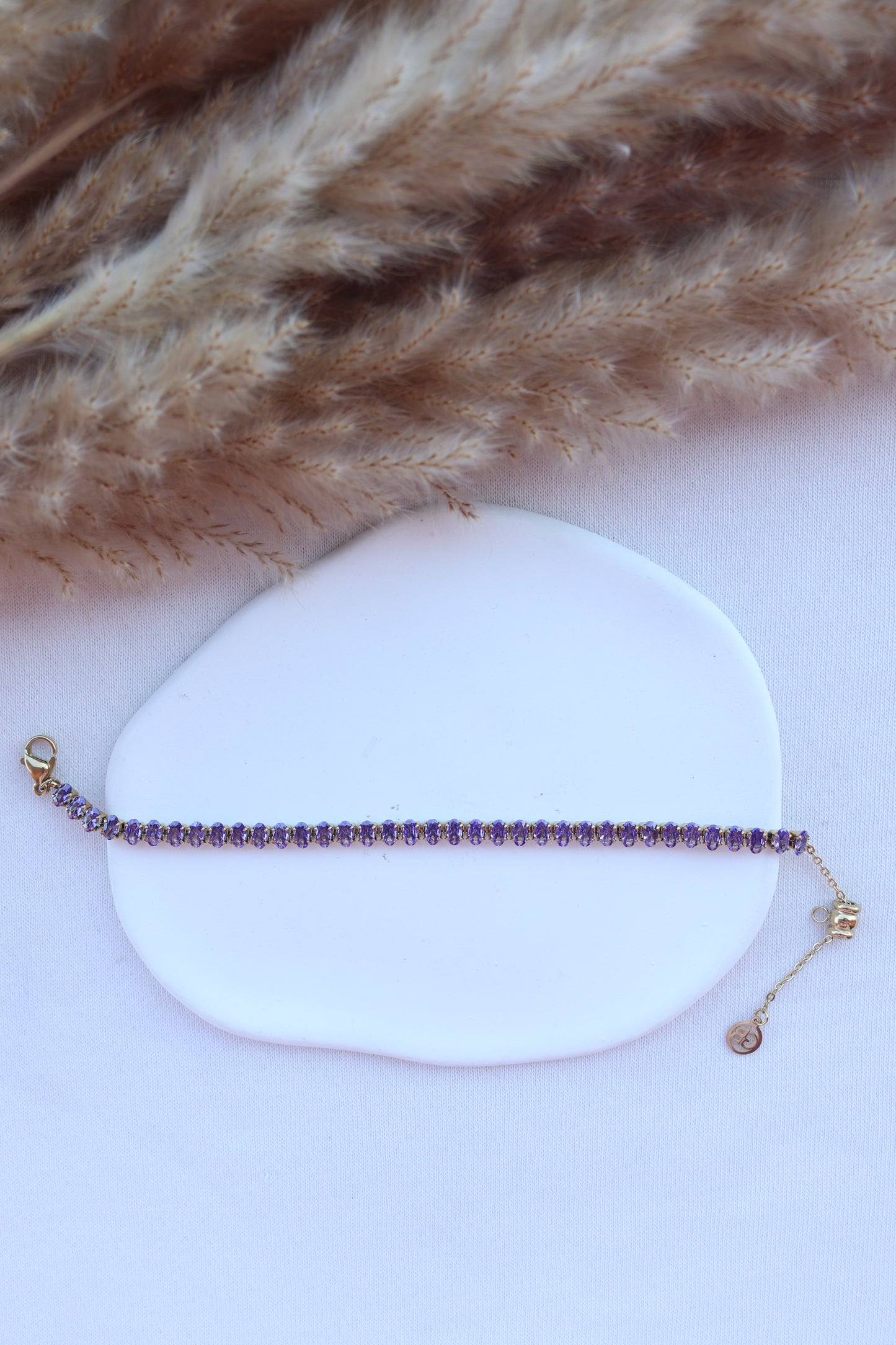 Pulseira de Aço Dourado Inspiração Swarovski com Zircônias Roxas
