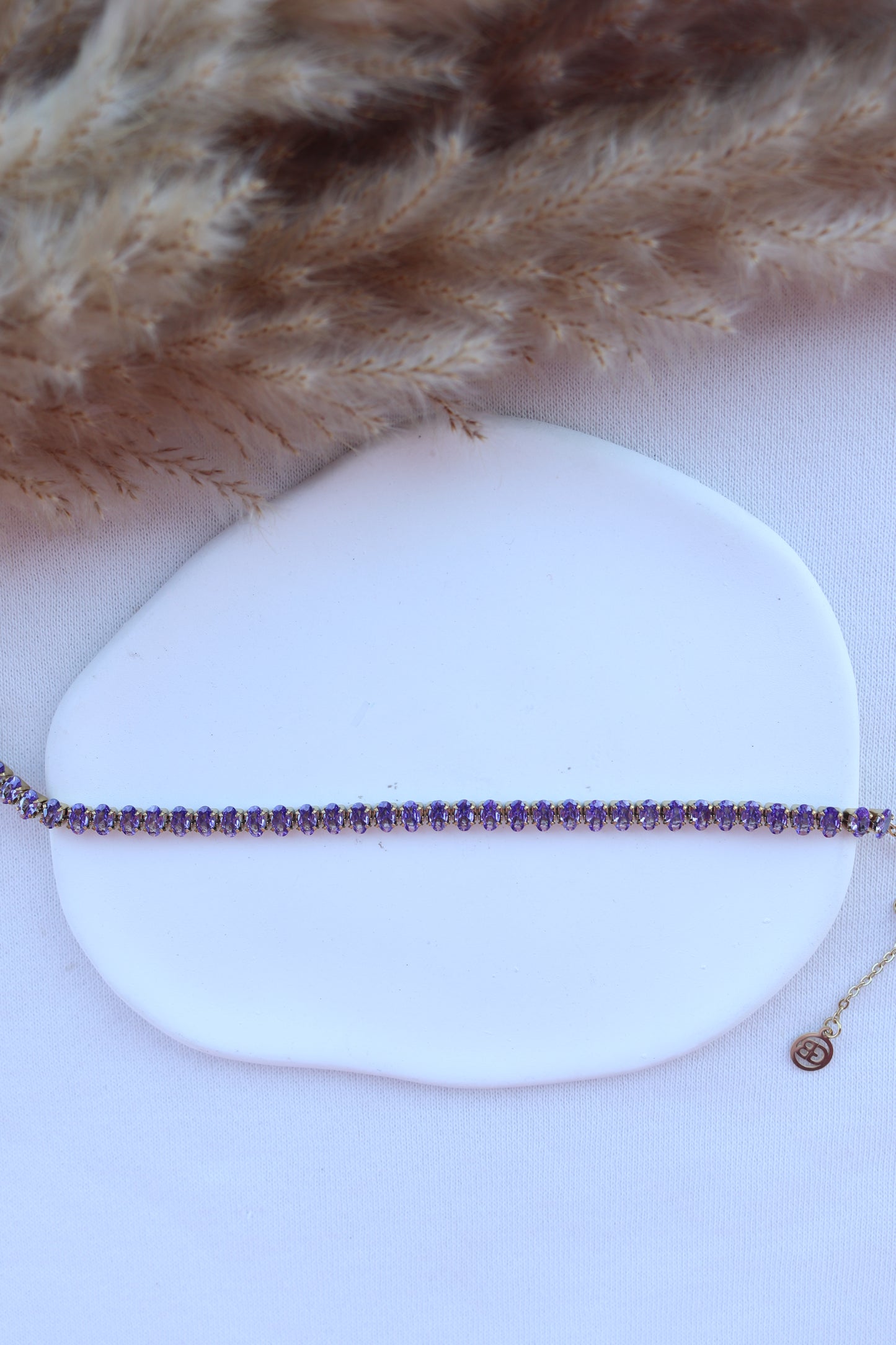Pulseira de Aço Dourado Inspiração Swarovski com Zircônias Roxas