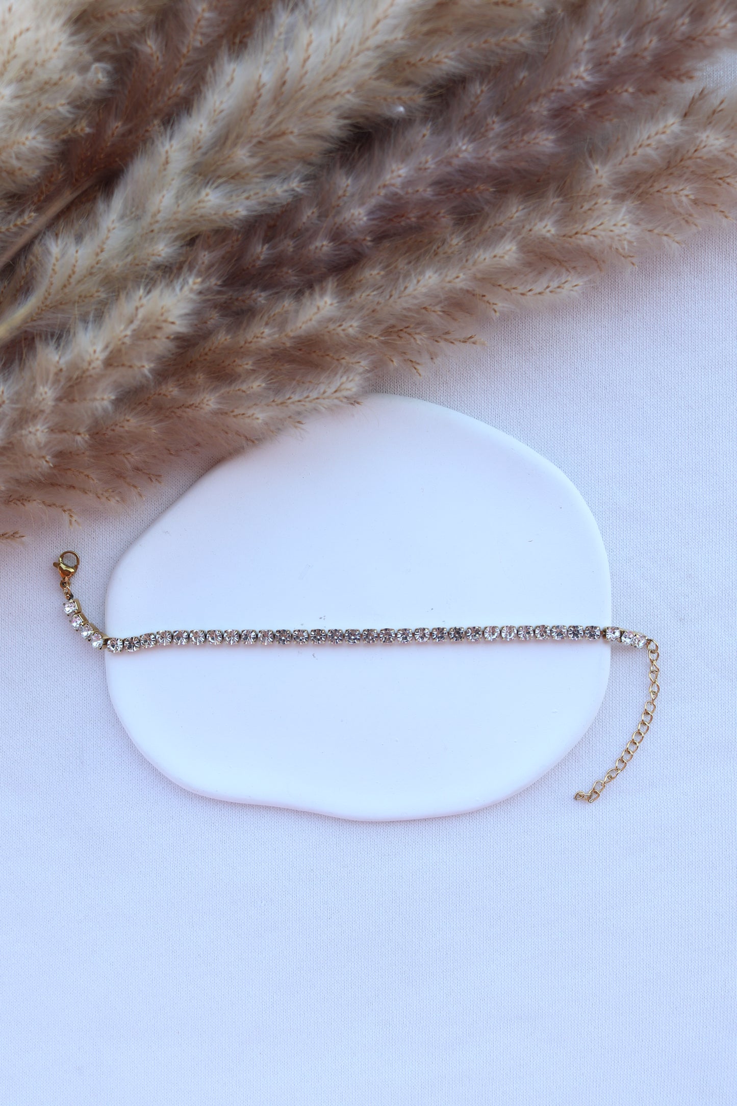 Pulseira de Aço Dourado com Zircônias Médias