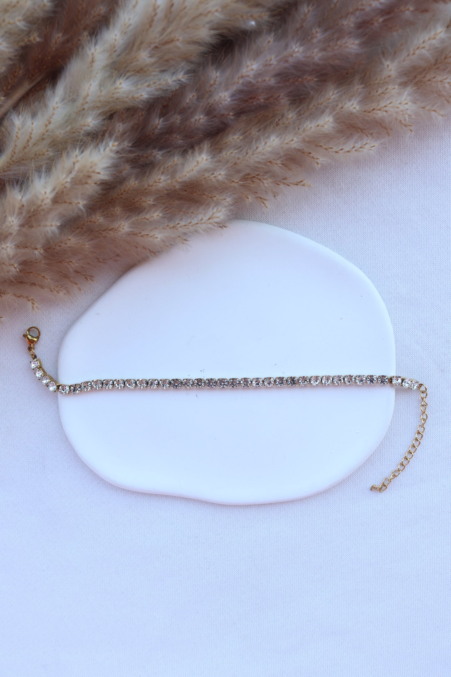 Pulseira de Aço Dourado com Zircônias Médias