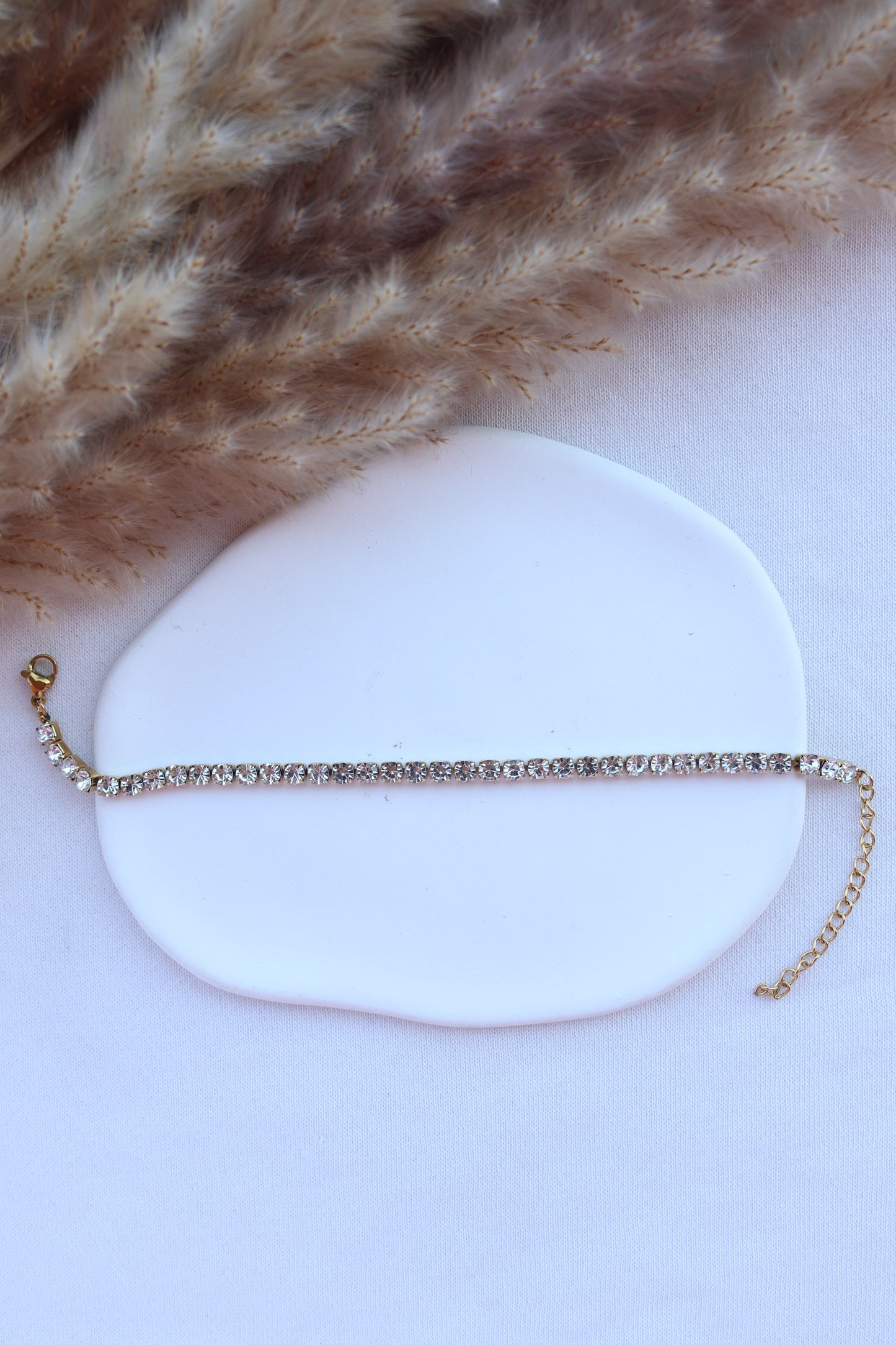 Pulseira de Aço Dourado com Zircônias Médias