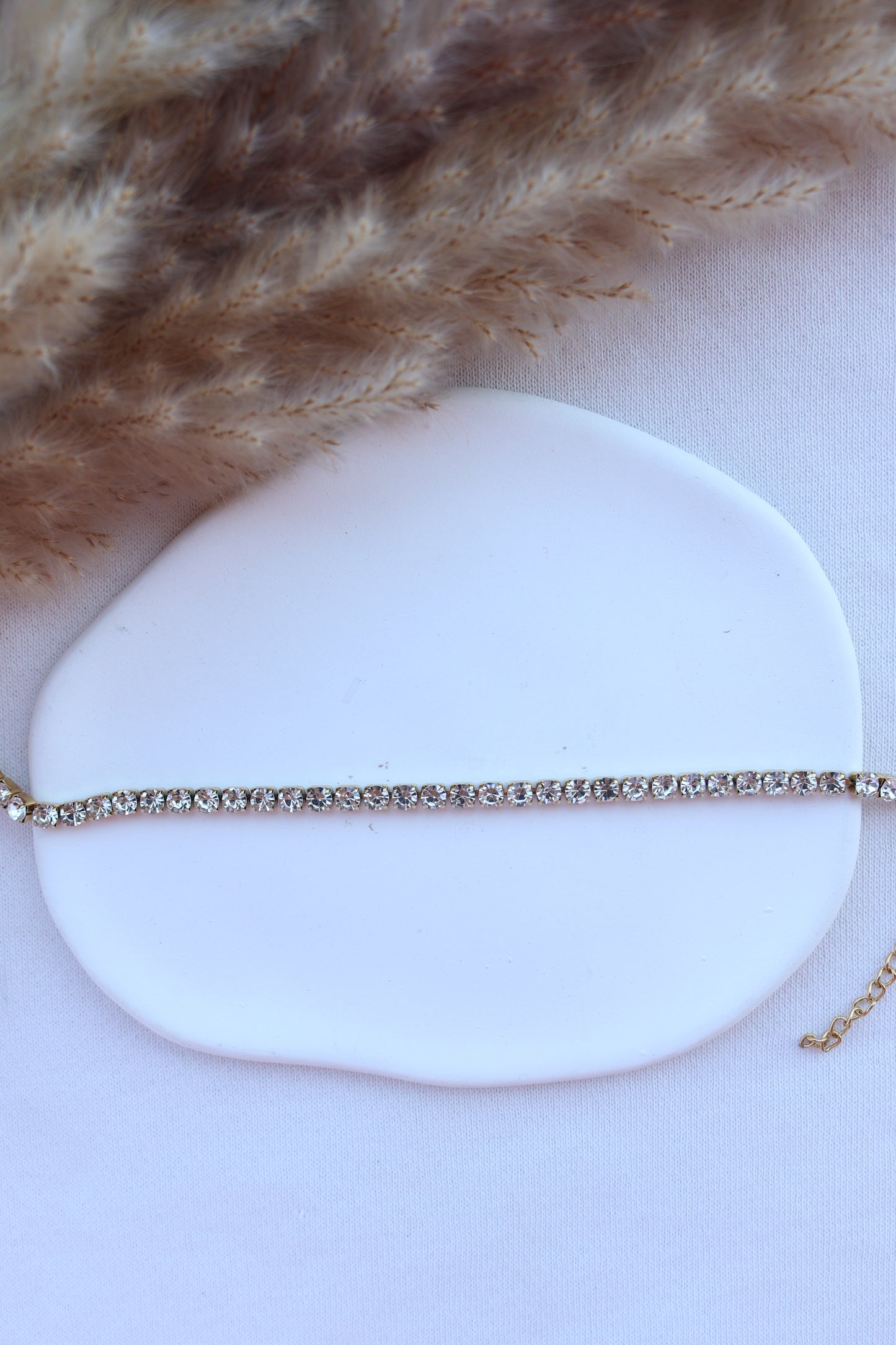 Pulseira de Aço Dourado com Zircônias Médias