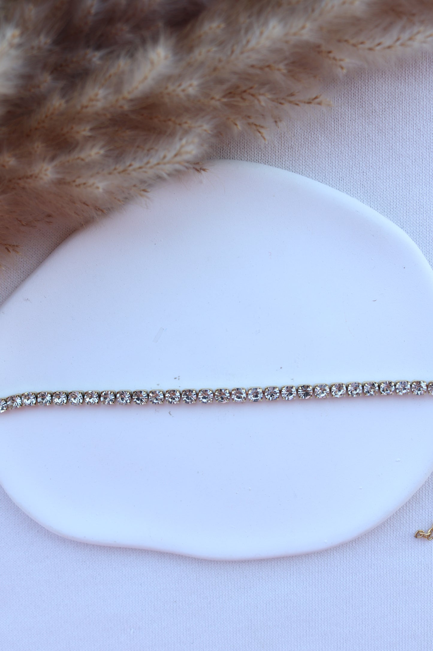 Pulseira de Aço Dourado com Zircônias Médias