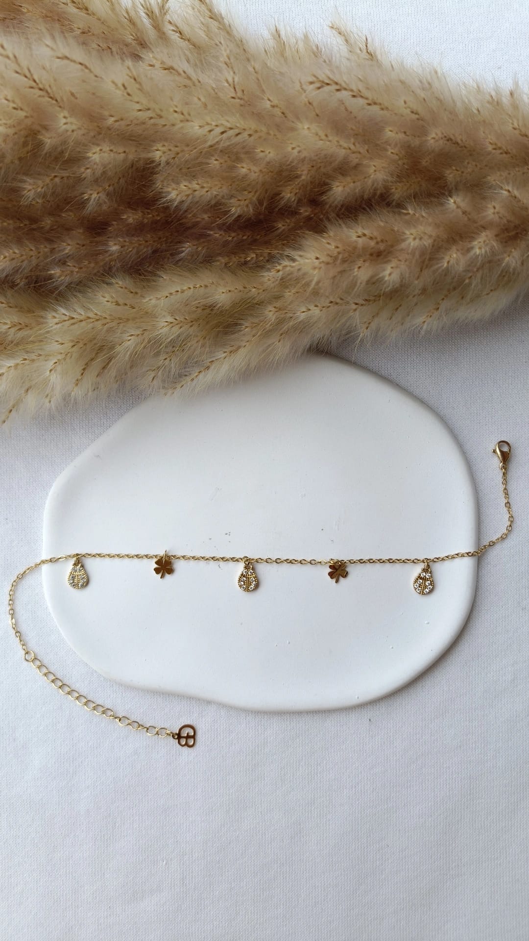 Pulseira de Aço Dourado de Pé de Joaninhas com Brilhantes