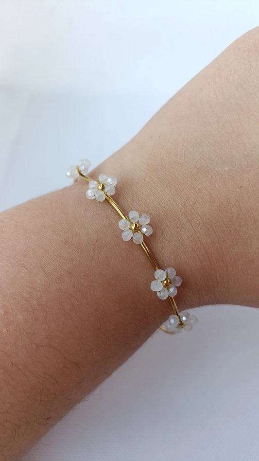 Pulseira de Aço Dourado Rígida com 5 Flores Brancas