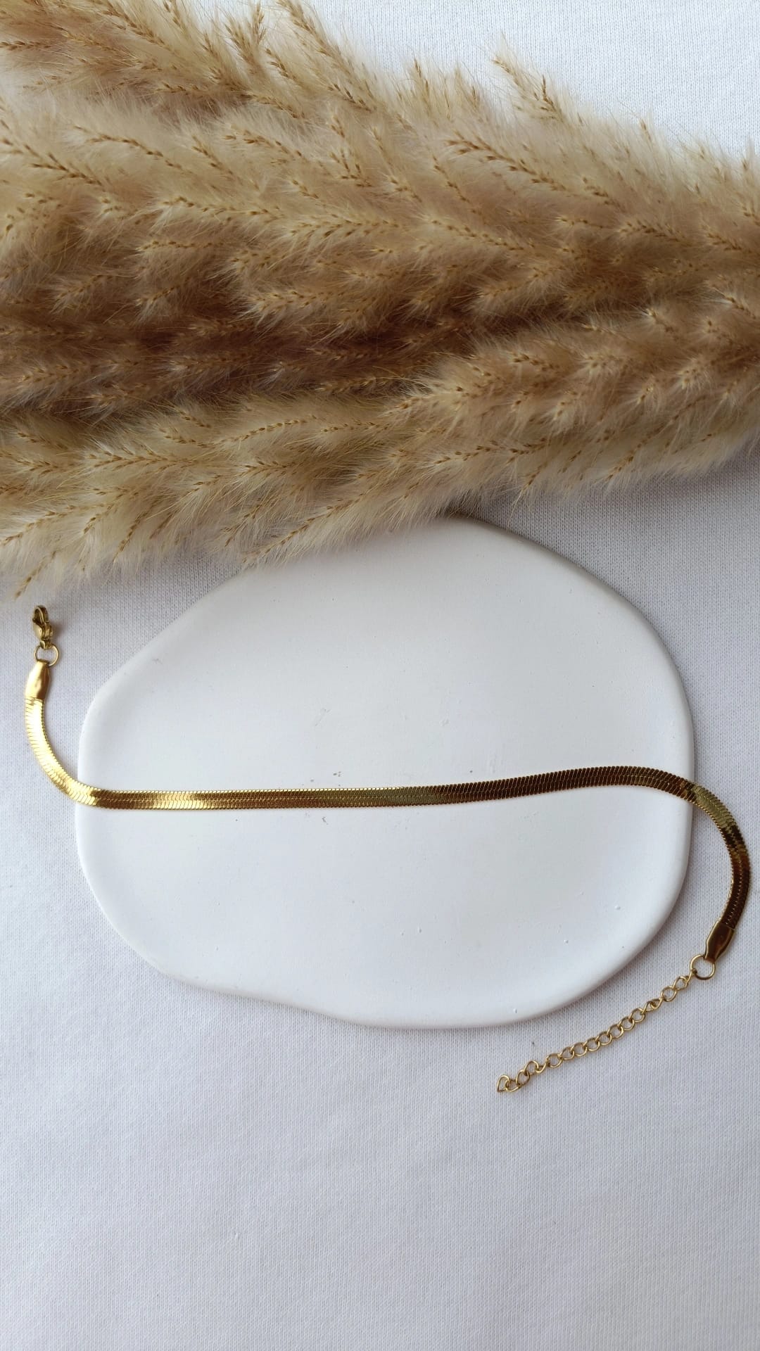 Pulseira de Aço Dourado de Pé de Malha Lisa