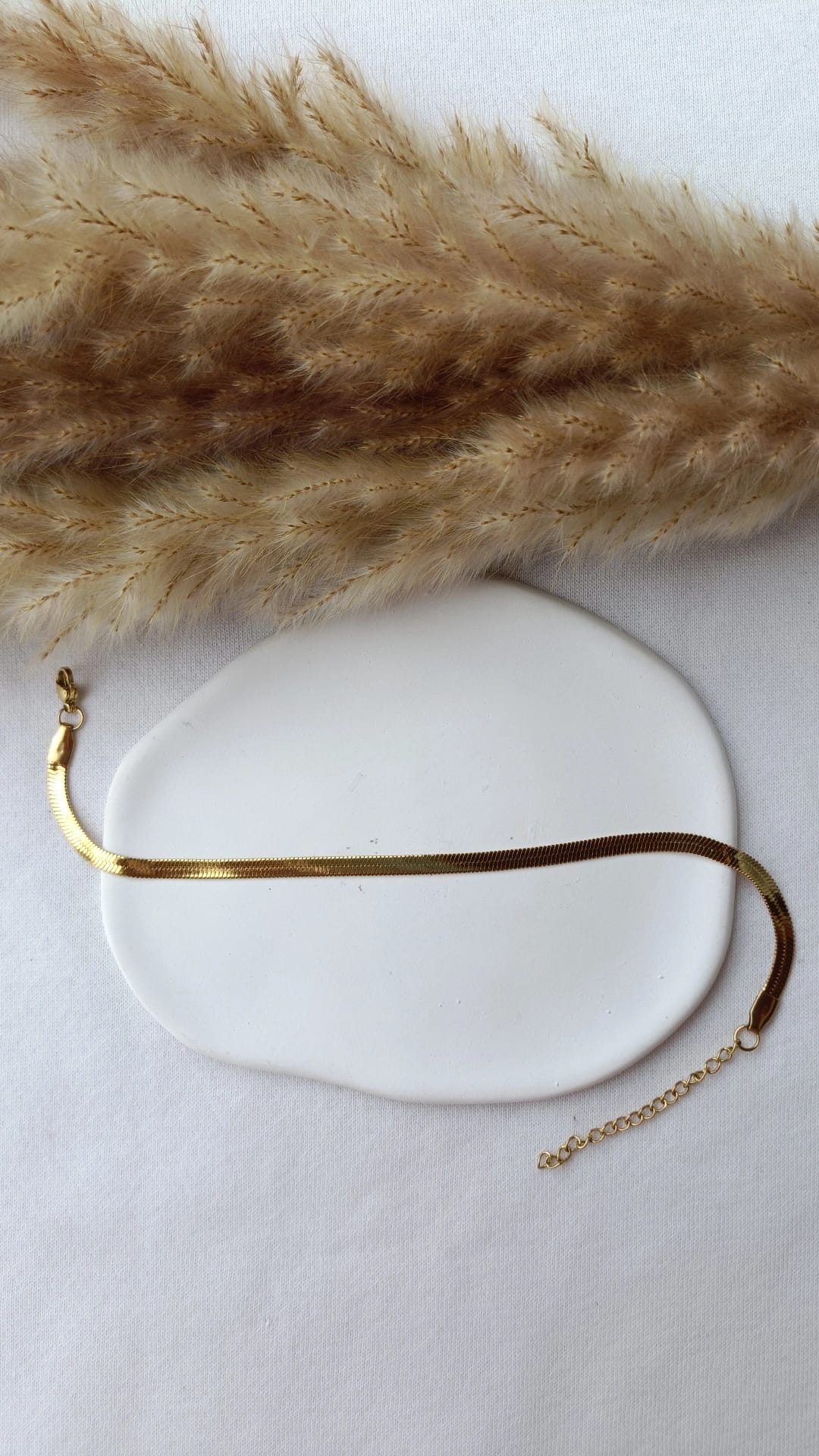 Pulseira de Aço Dourado de Pé de Malha Lisa