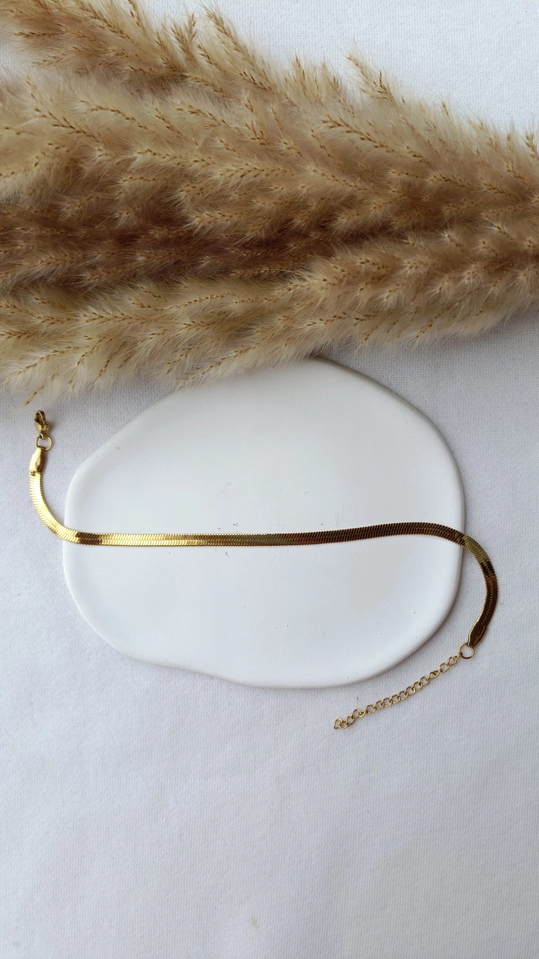 Pulseira de Aço Dourado de Pé de Malha Lisa