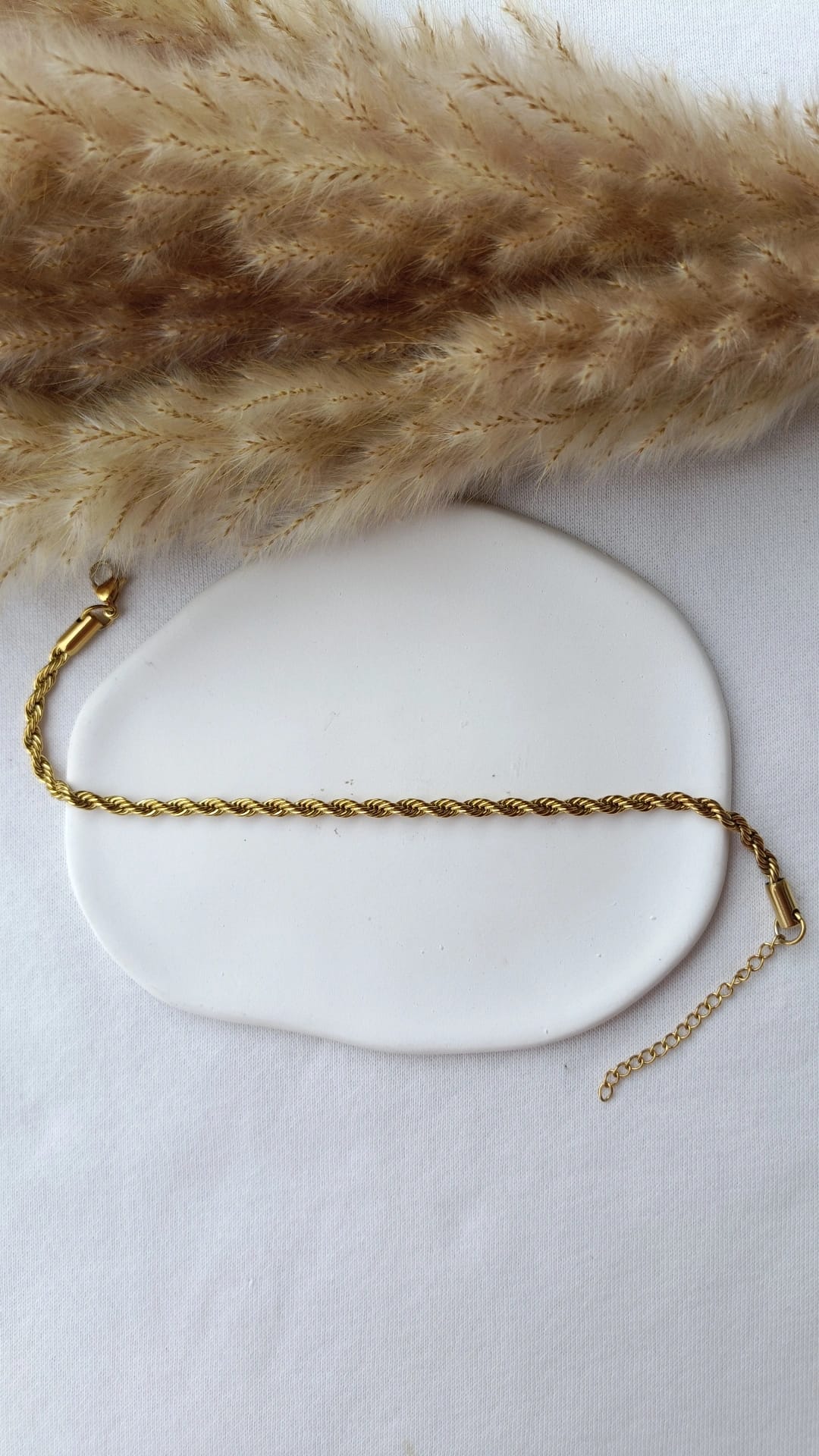 Pulseira de Aço Dourado de Pé Entrelaçada