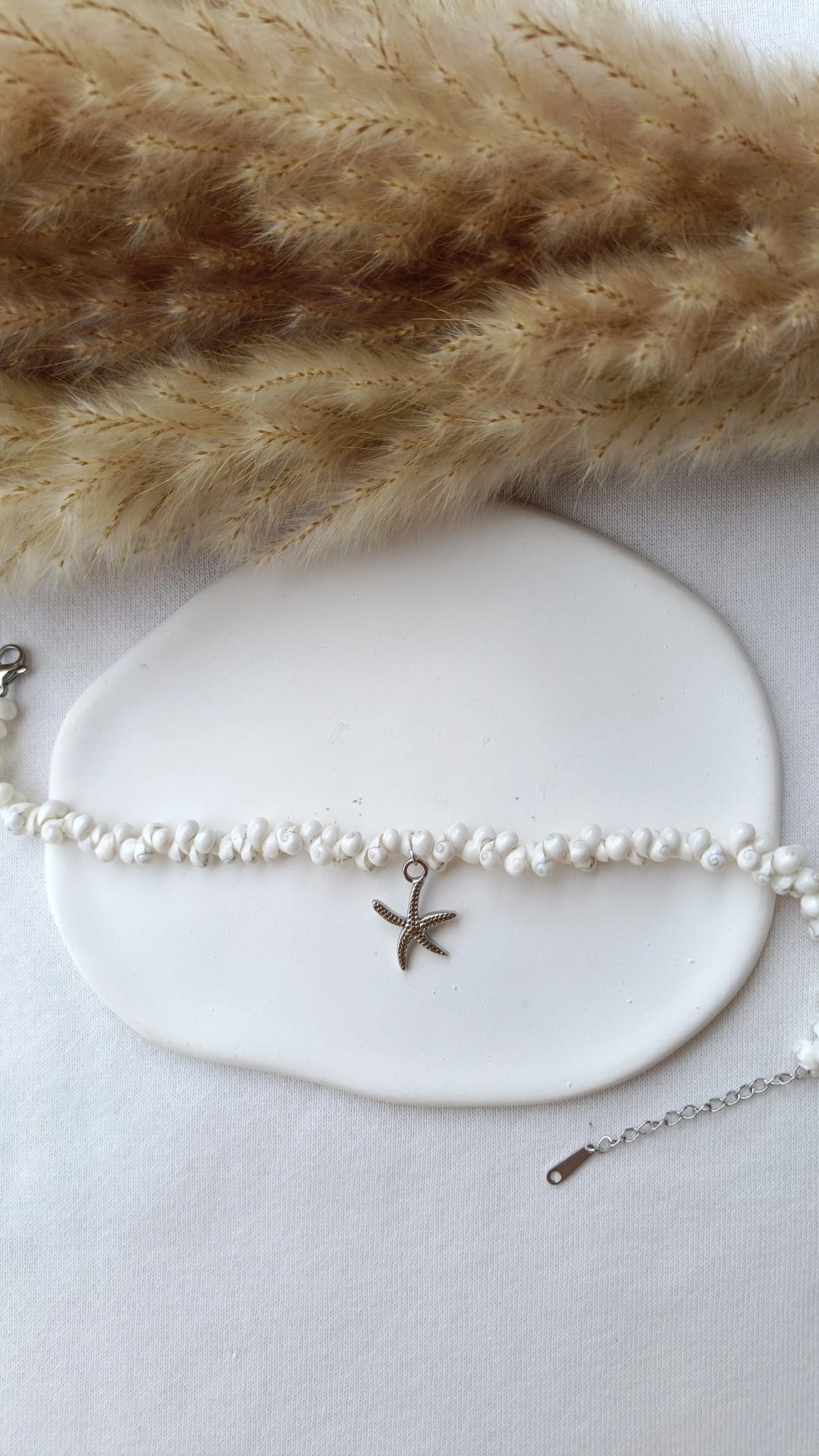 Pulseira de Aço Prateado com Pendente de Estrela