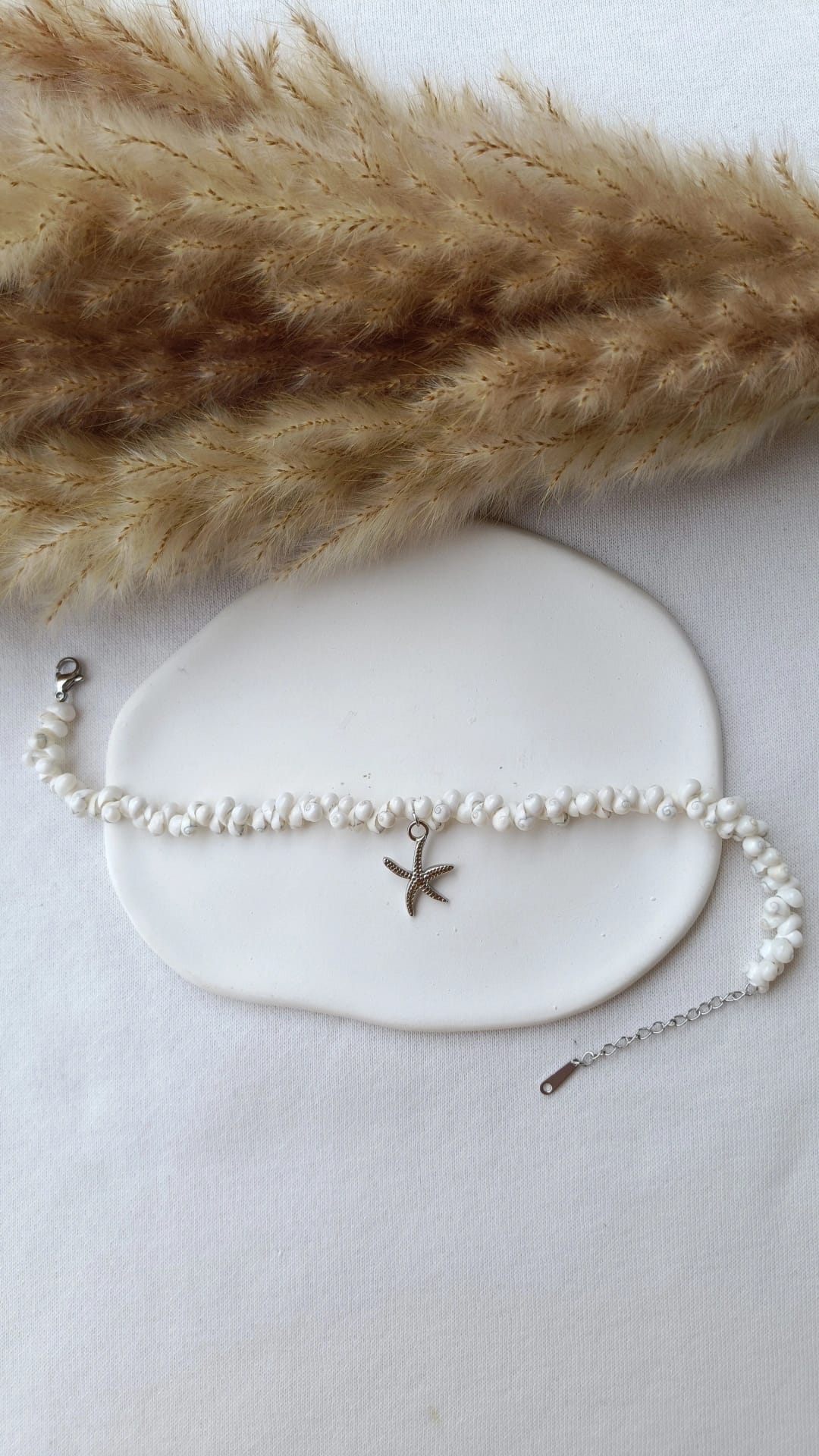 Pulseira de Aço Prateado com Pendente de Estrela