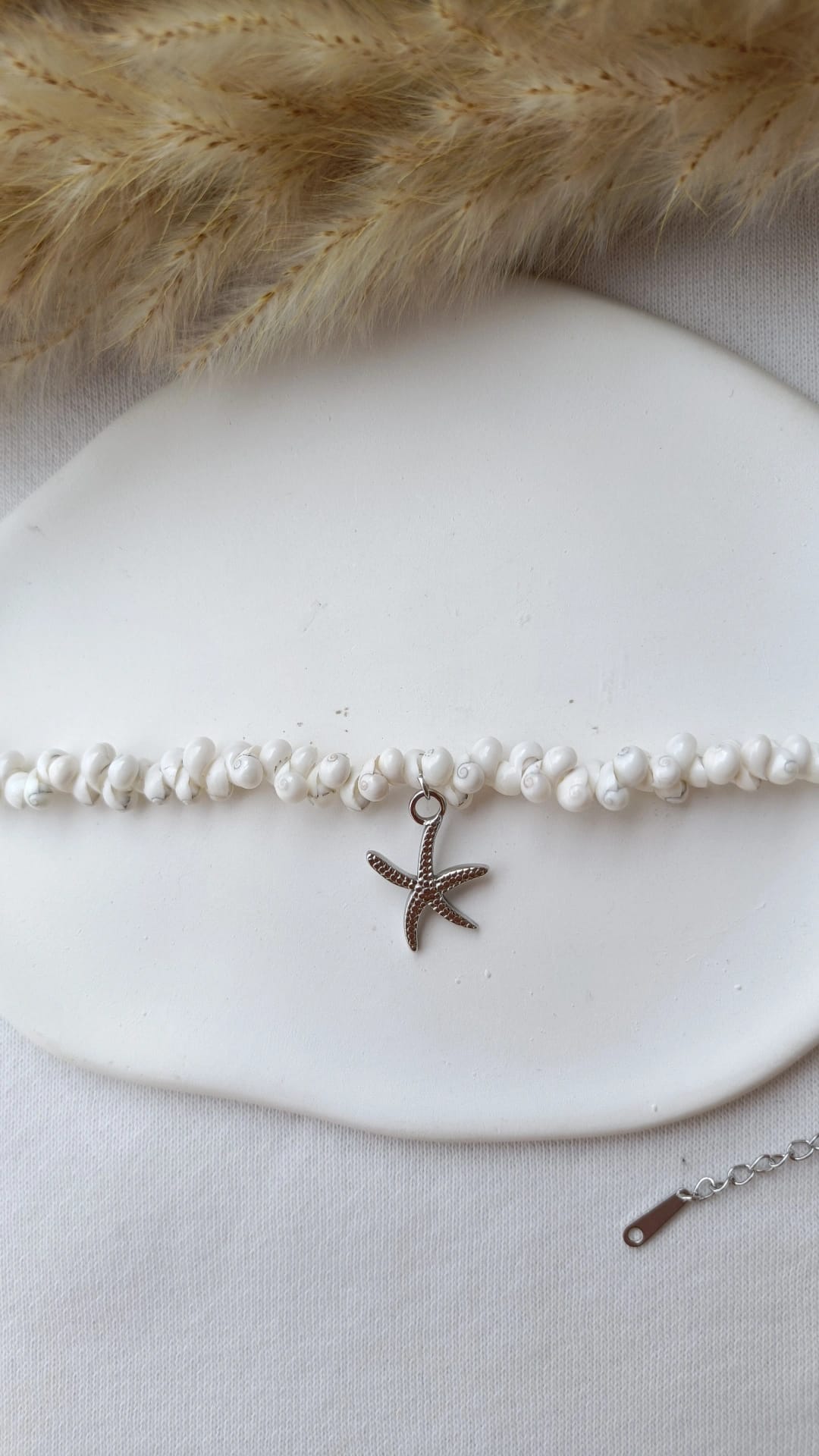 Pulseira de Aço Prateado com Pendente de Estrela