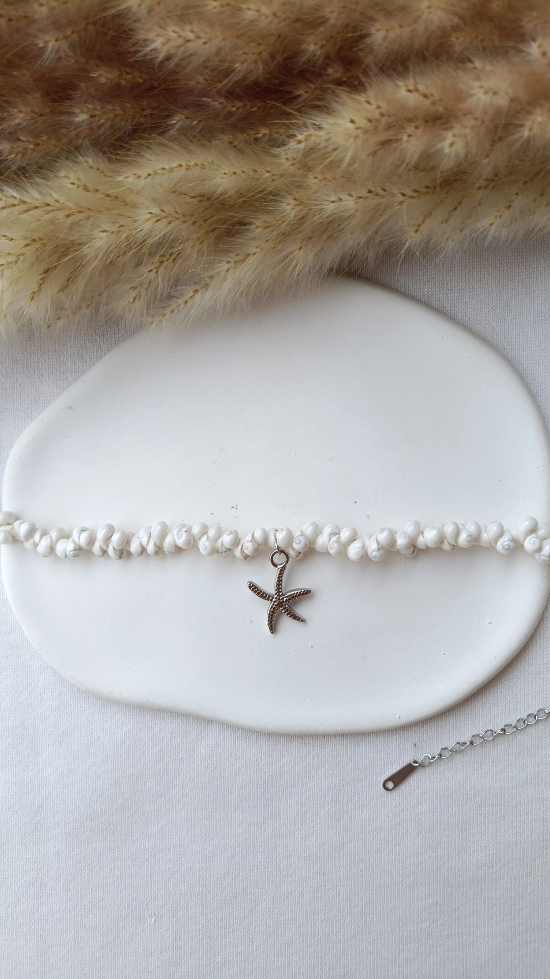 Pulseira de Aço Prateado com Pendente de Estrela
