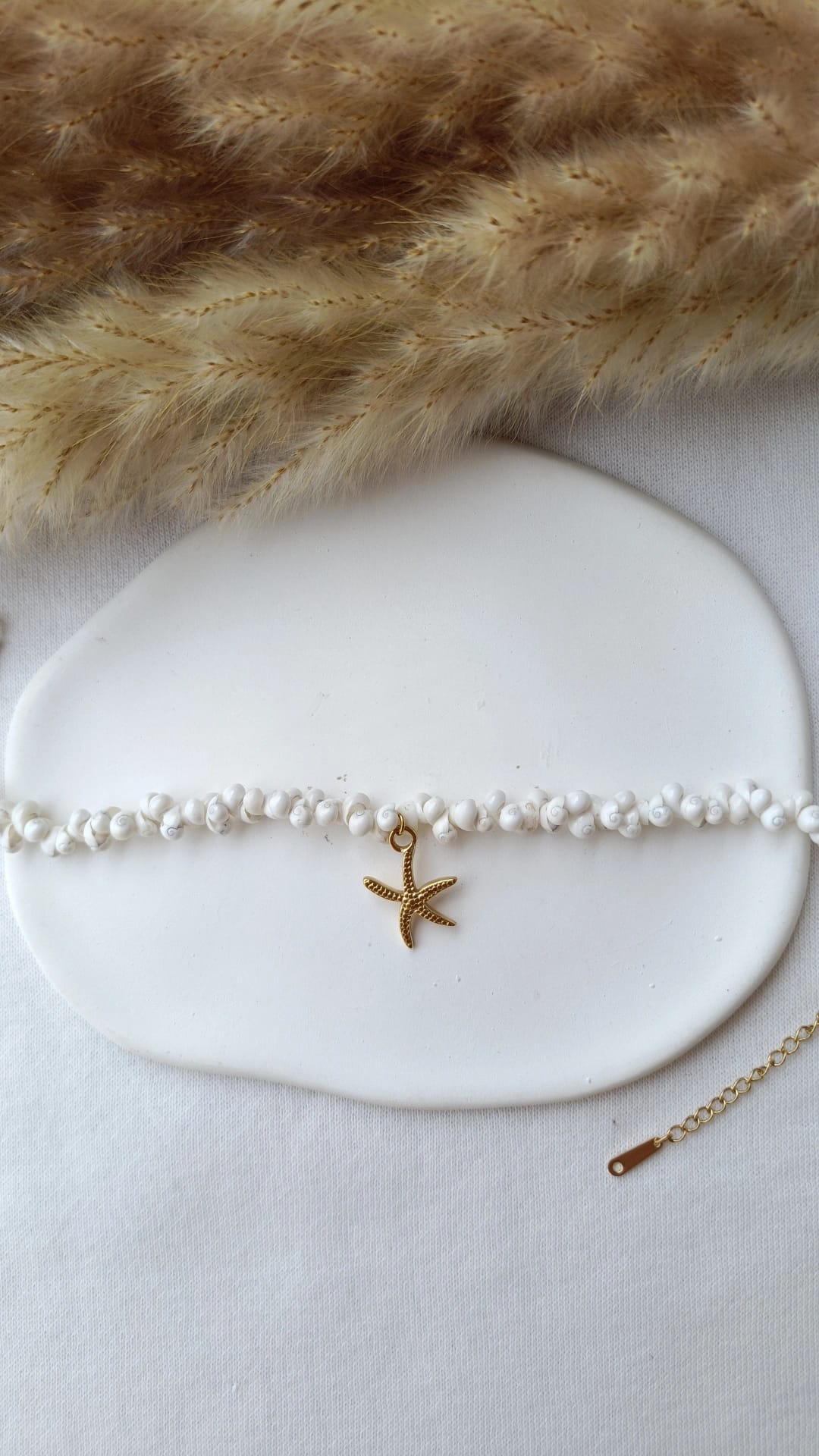 Pulseira de Aço Dourado com Pendente de Estrela