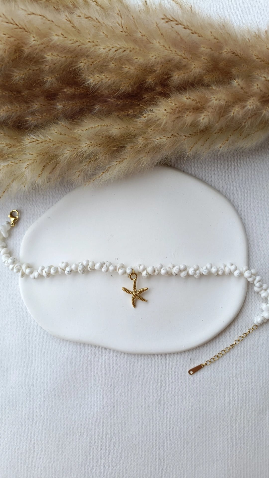 Pulseira de Aço Dourado com Pendente de Estrela