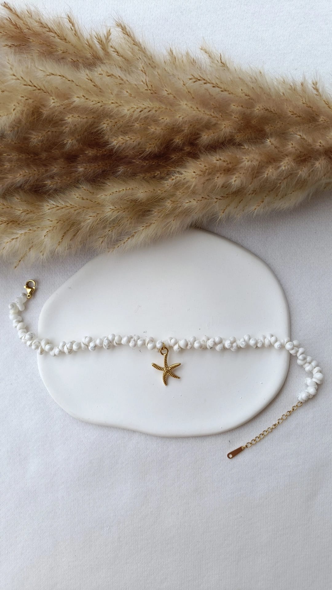 Pulseira de Aço Dourado com Pendente de Estrela