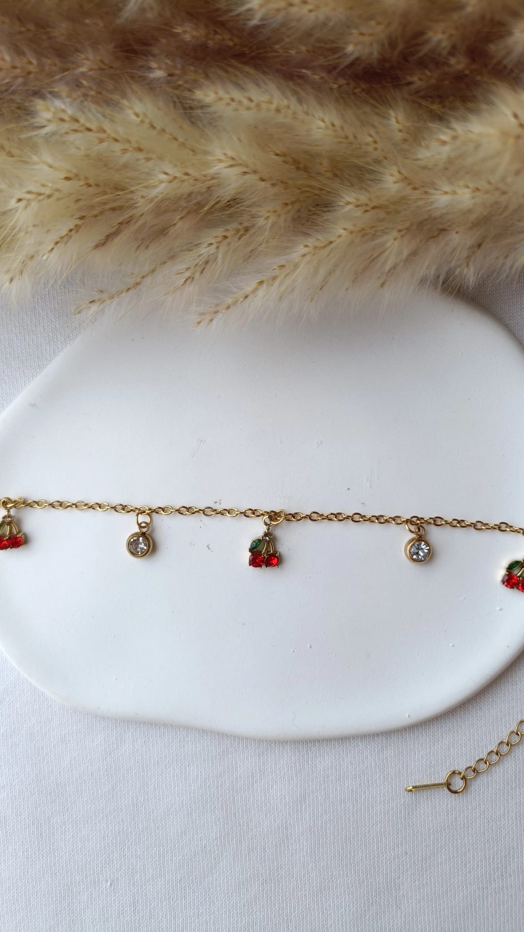 Pulseira de Aço Dourado com Cerejas