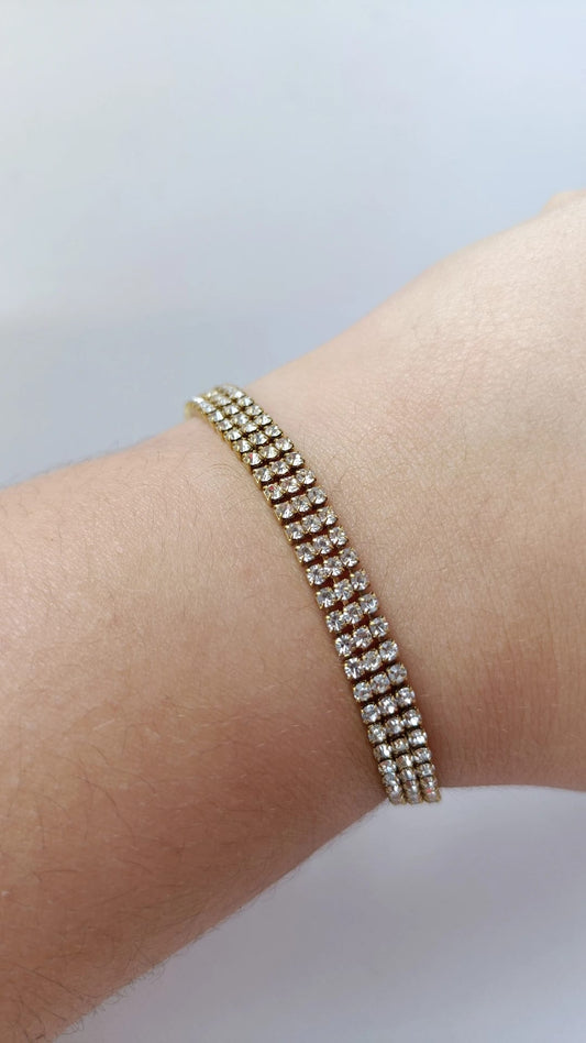 Pulseira de Aço Dourado Tripla com Brilhantes