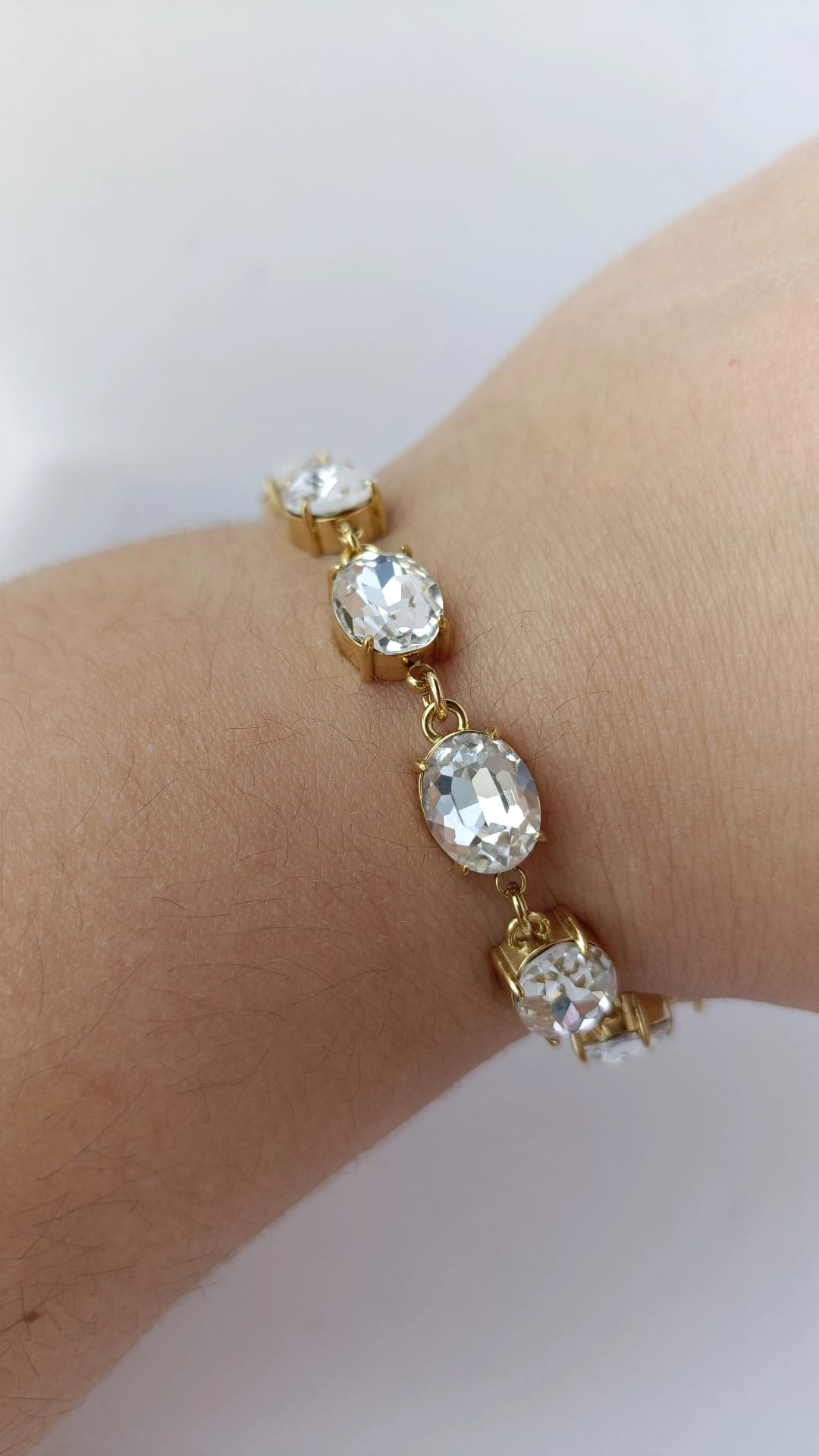 Pulseira de Aço Dourado com Zircônias Ovais