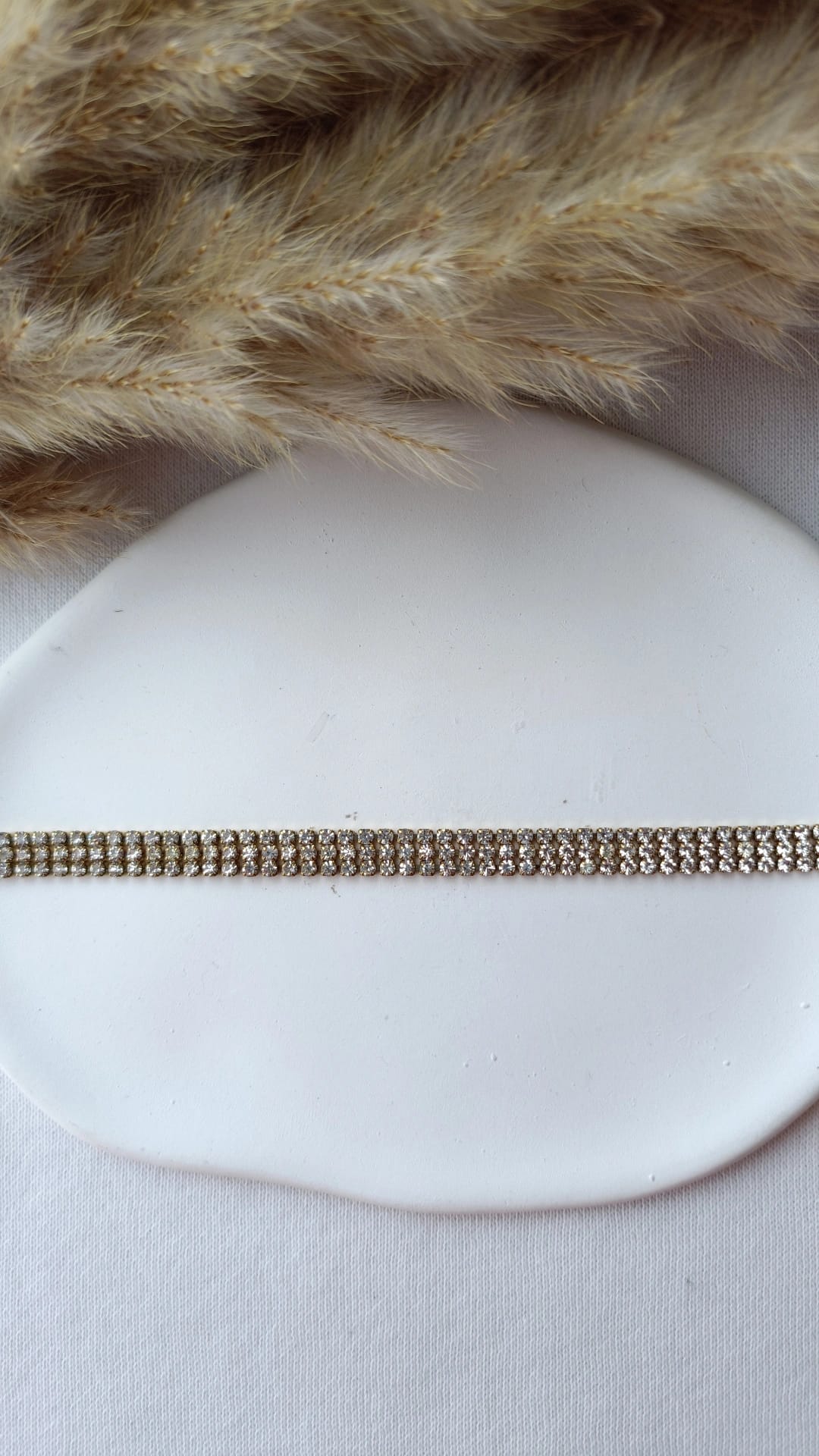 Pulseira de Aço Dourado Tripla com Brilhantes