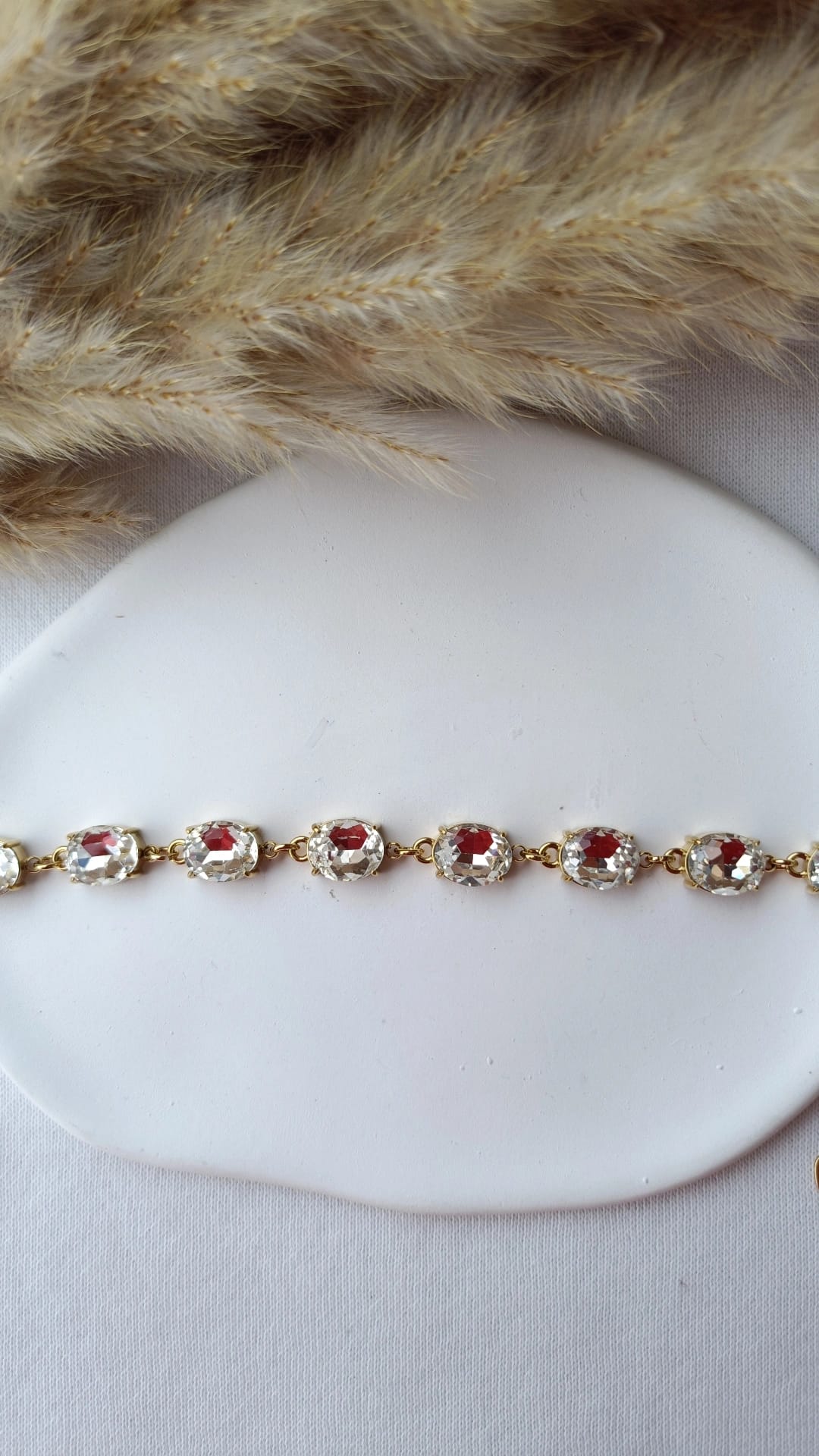 Pulseira de Aço Dourado com Zircônias Ovais