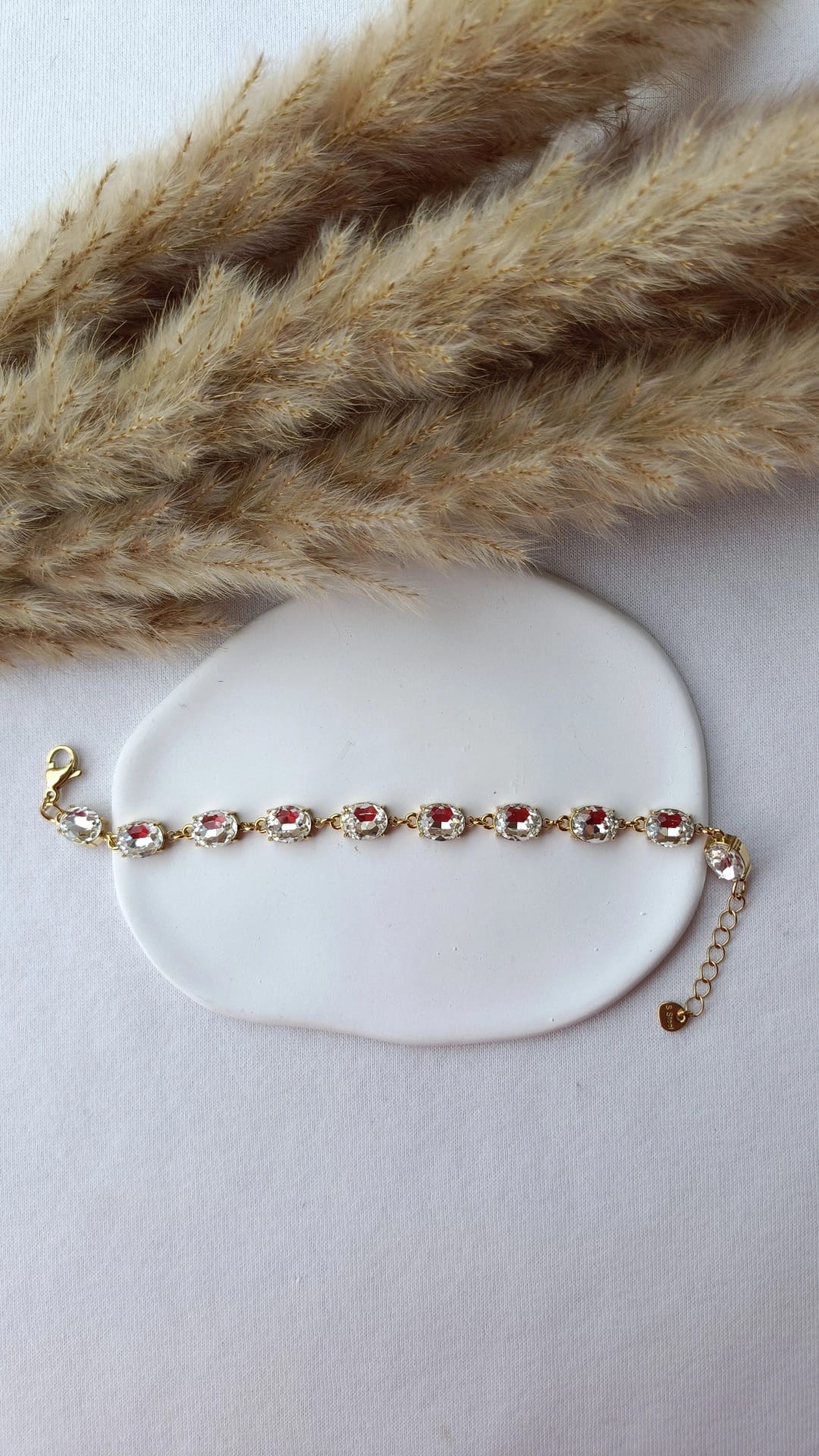 Pulseira de Aço Dourado com Zircônias Ovais