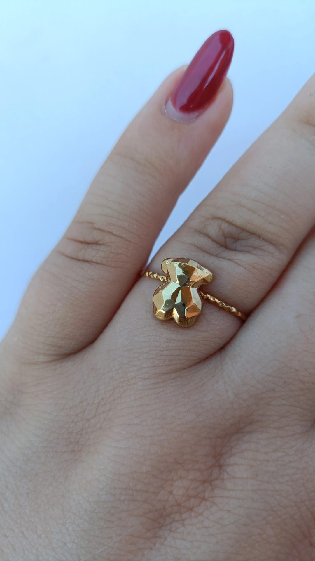 Anel de Aço Dourado de Urso