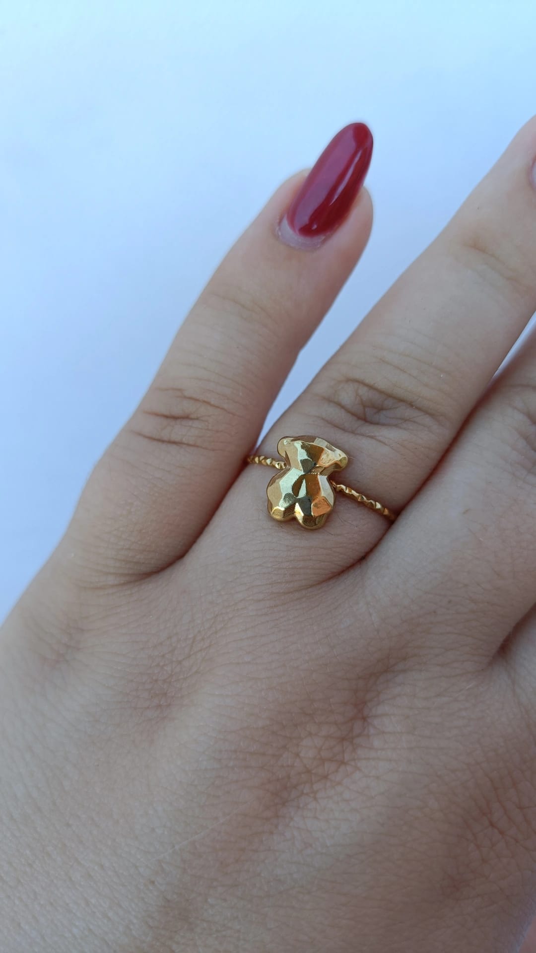 Anel de Aço Dourado de Urso
