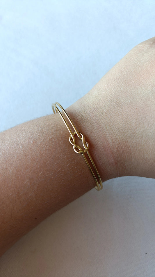 Pulseira de Aço Dourado Rígida de Nó Circular