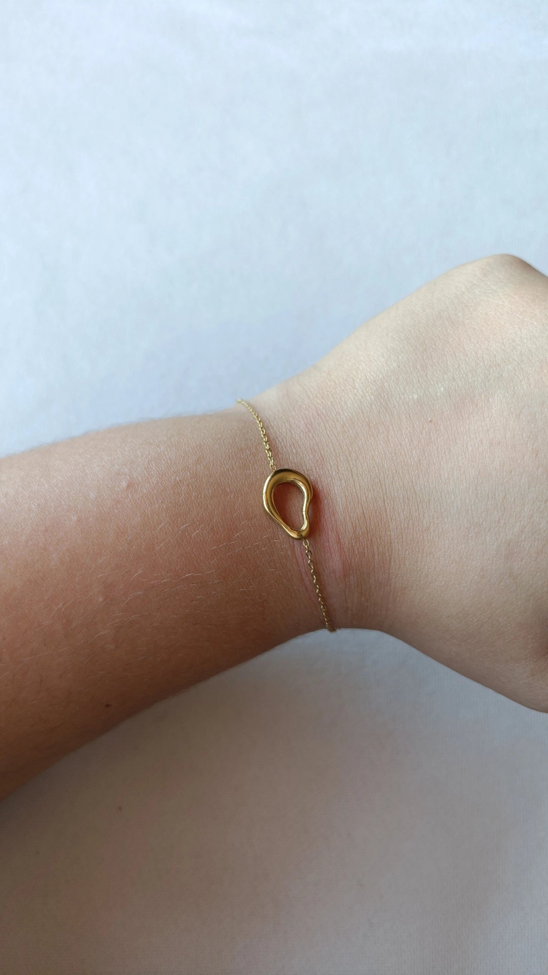 Pulseira de Aço Dourado Oval Irregular