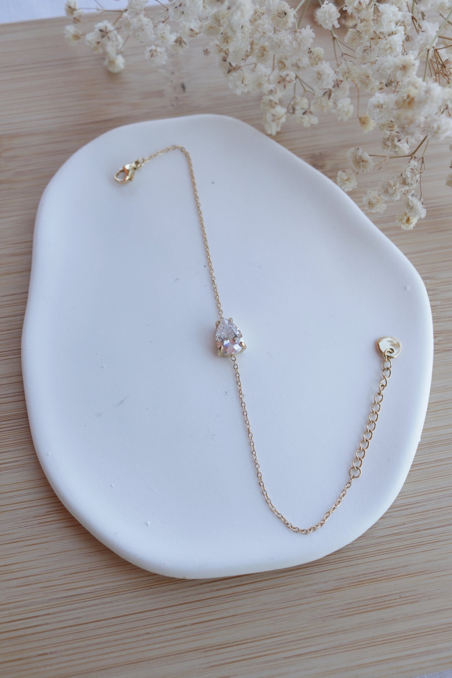 Pulseira de Aço Dourado com Zircónica Branca de Gota