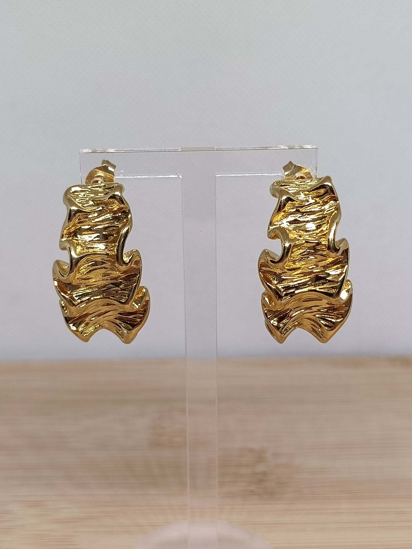 Brincos de Aço Dourado Irregulares