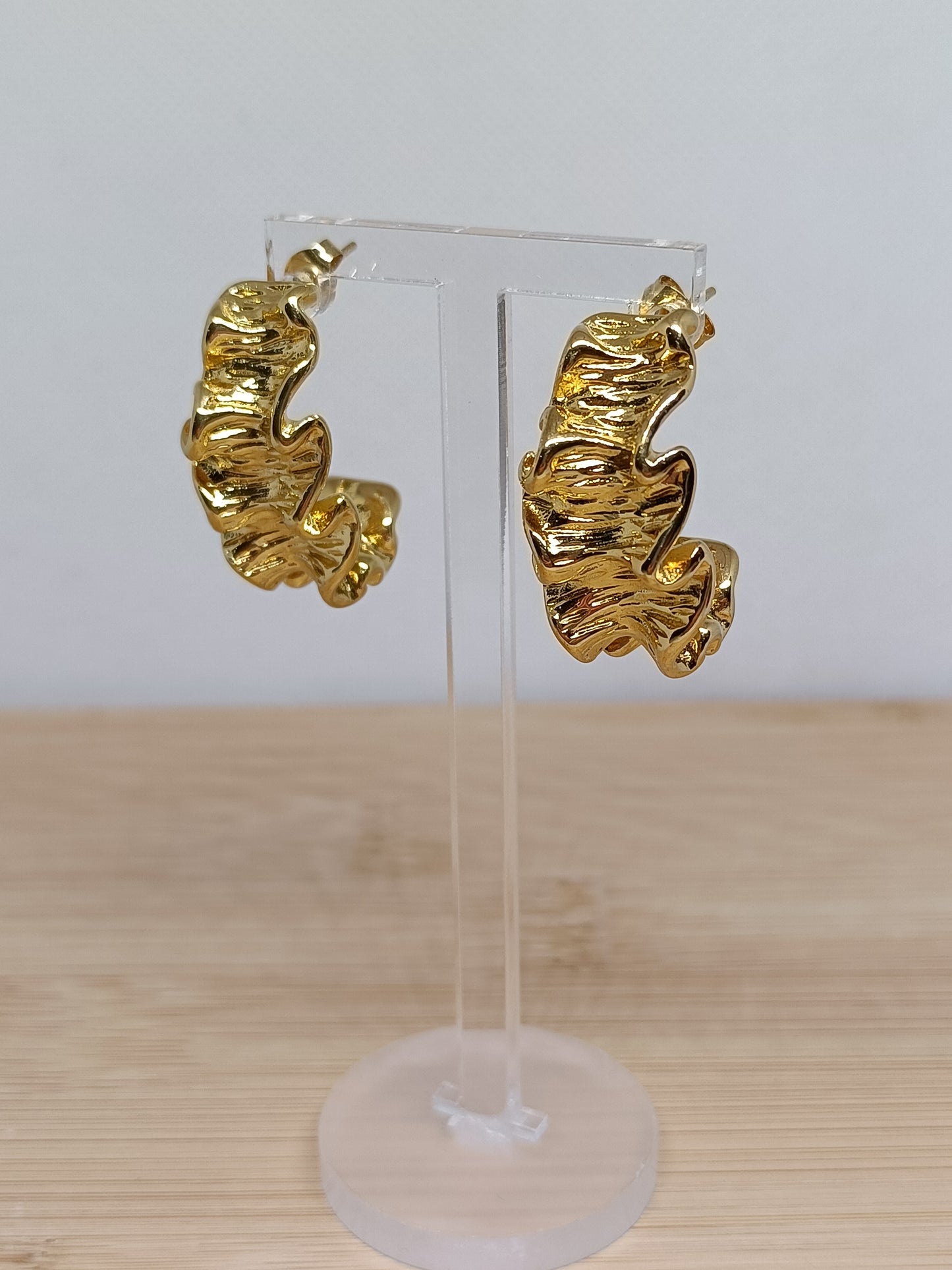 Brincos de Aço Dourado Irregulares