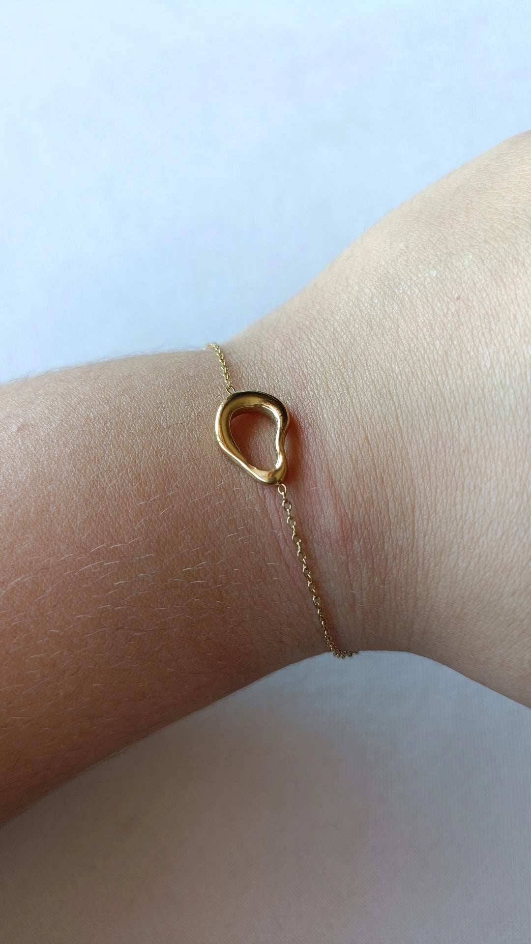 Pulseira de Aço Dourado Oval Irregular