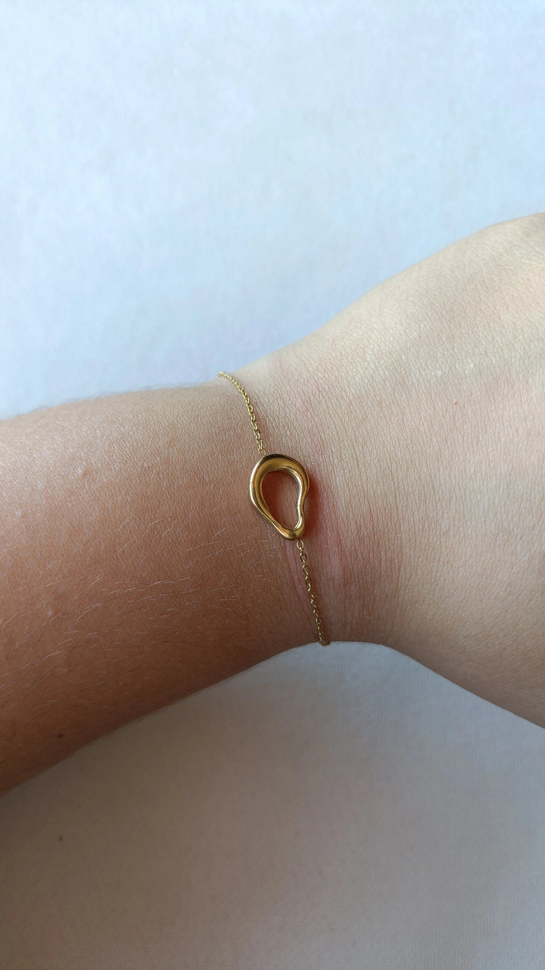 Pulseira de Aço Dourado Oval Irregular